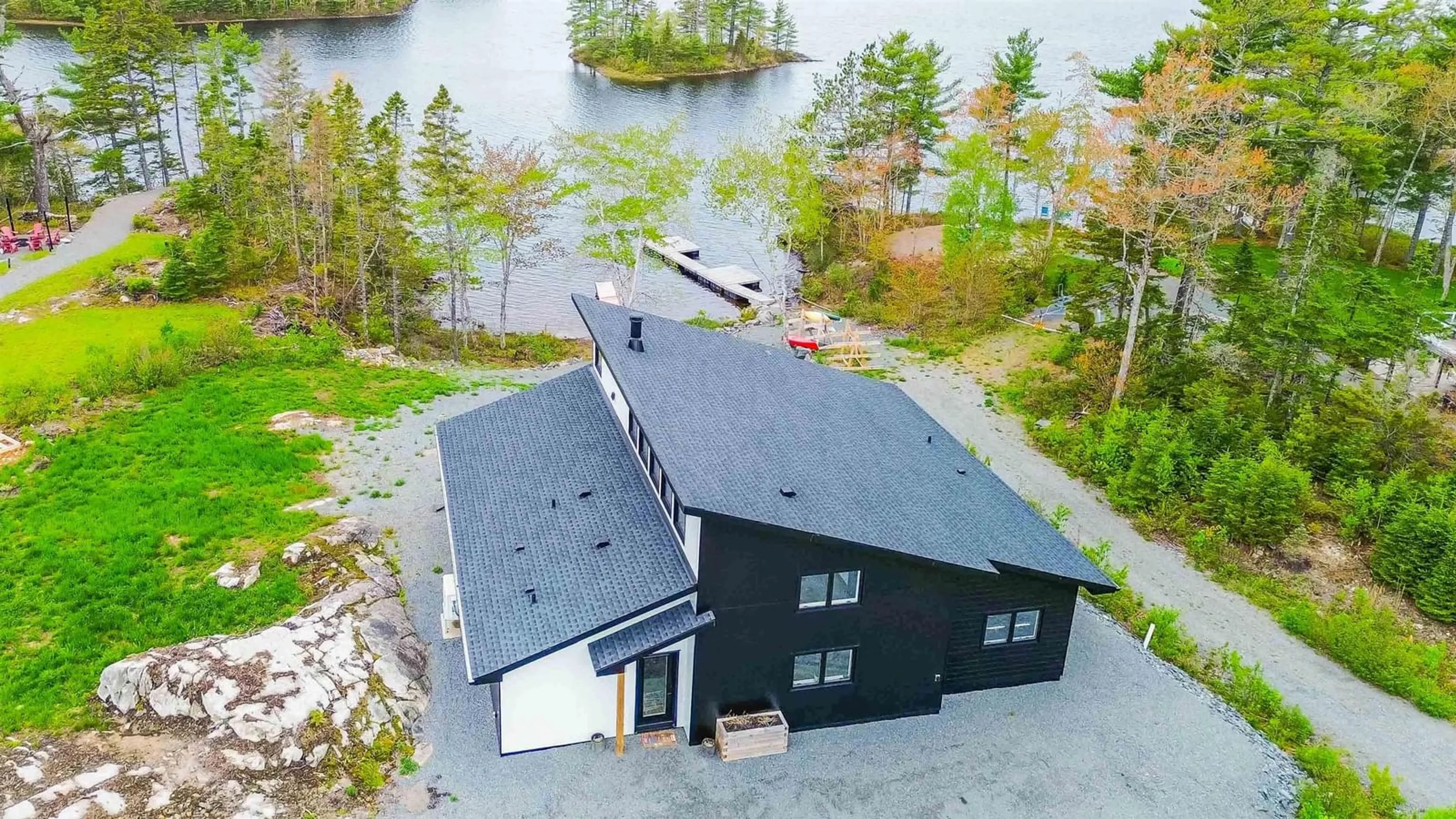 A pic from outside/outdoor area/front of a property/back of a property/a pic from drone, water/lake/river/ocean view for 242 Heritage Way, East Uniacke Nova Scotia B0N 1Z0