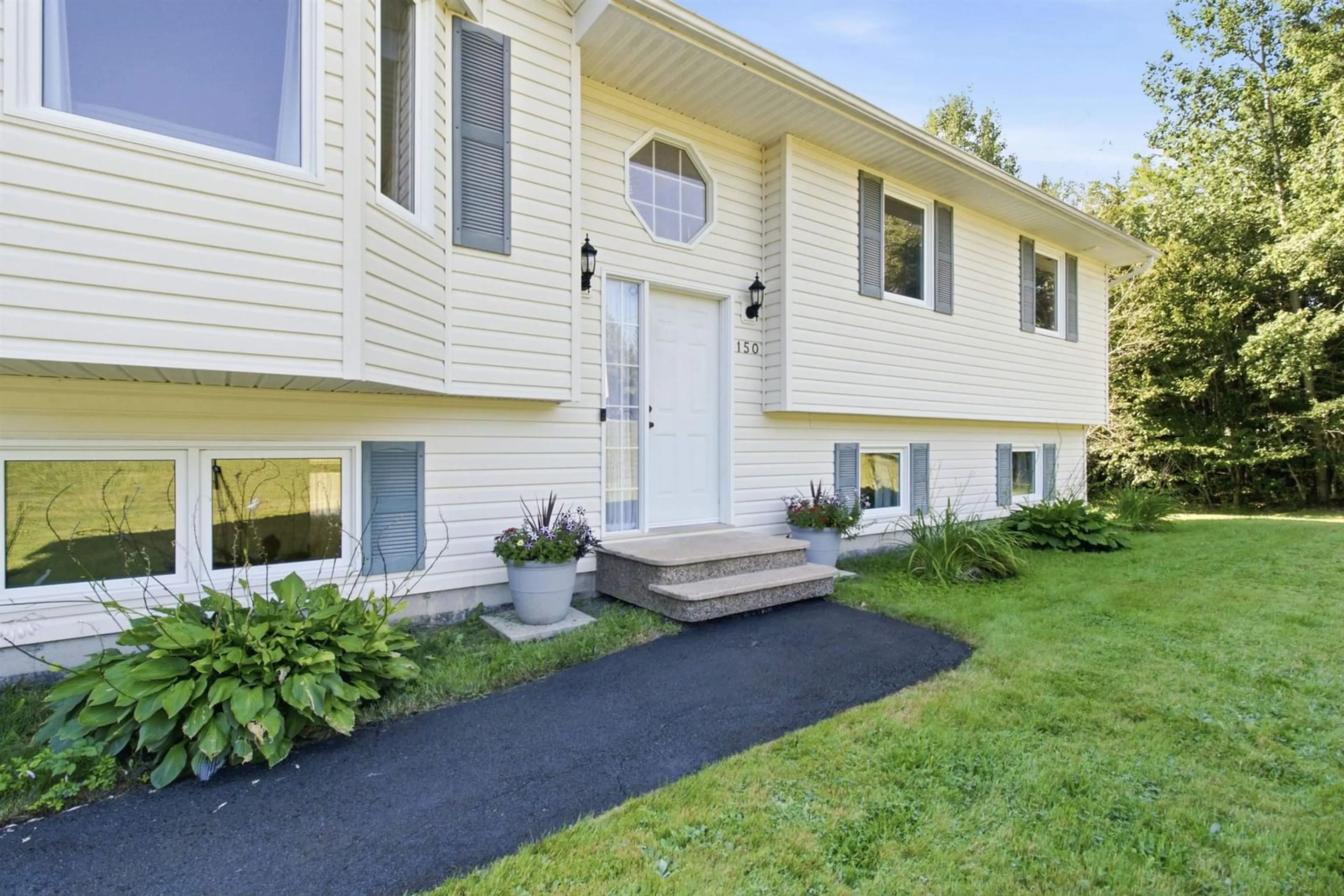 Home with vinyl exterior material, street for 150 Lindforest Crt, Middle Sackville Nova Scotia B4E 3J2