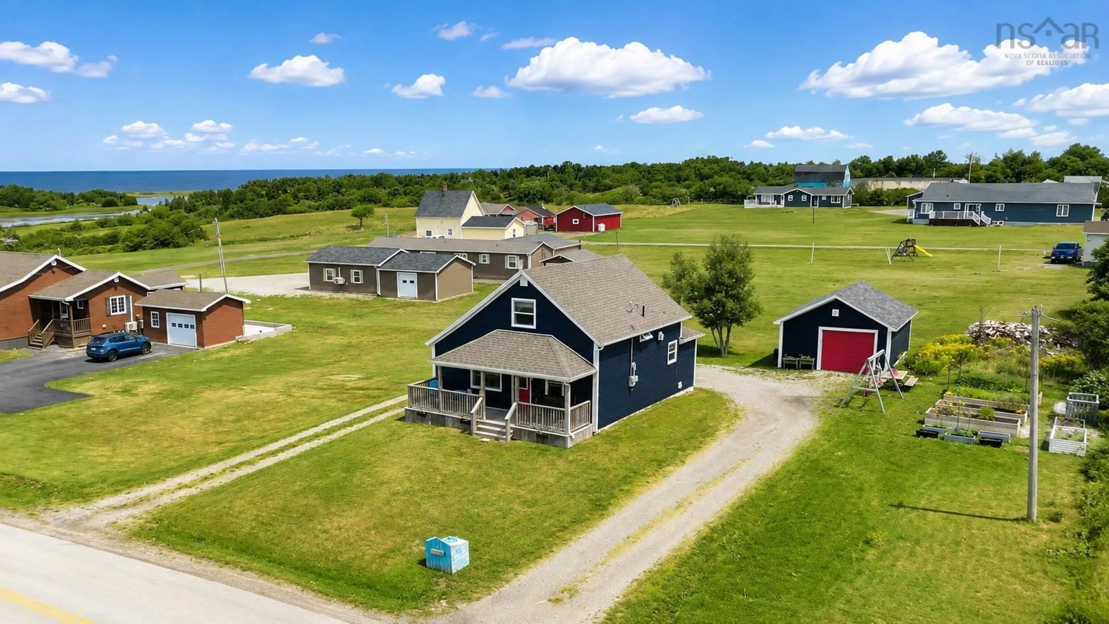 A pic from outside/outdoor area/front of a property/back of a property/a pic from drone, building for 35 Chemin Broussard, Petit Étang Nova Scotia B0E 2M0