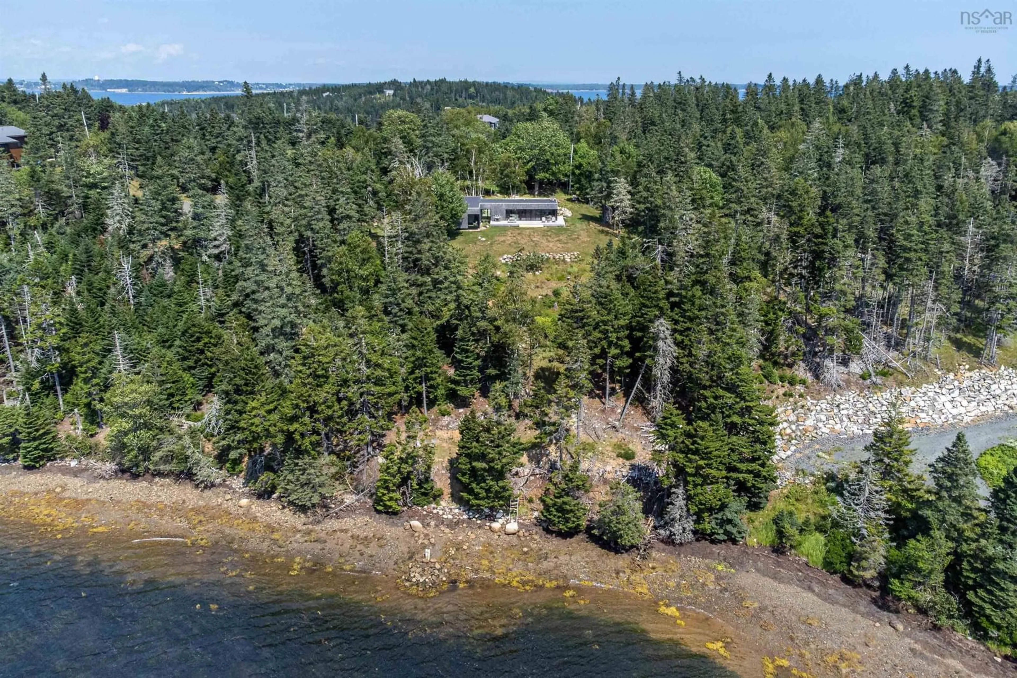 A pic from outside/outdoor area/front of a property/back of a property/a pic from drone, water/lake/river/ocean view for 143 South Cove Dr, Feltzen South Nova Scotia B0J 2X0