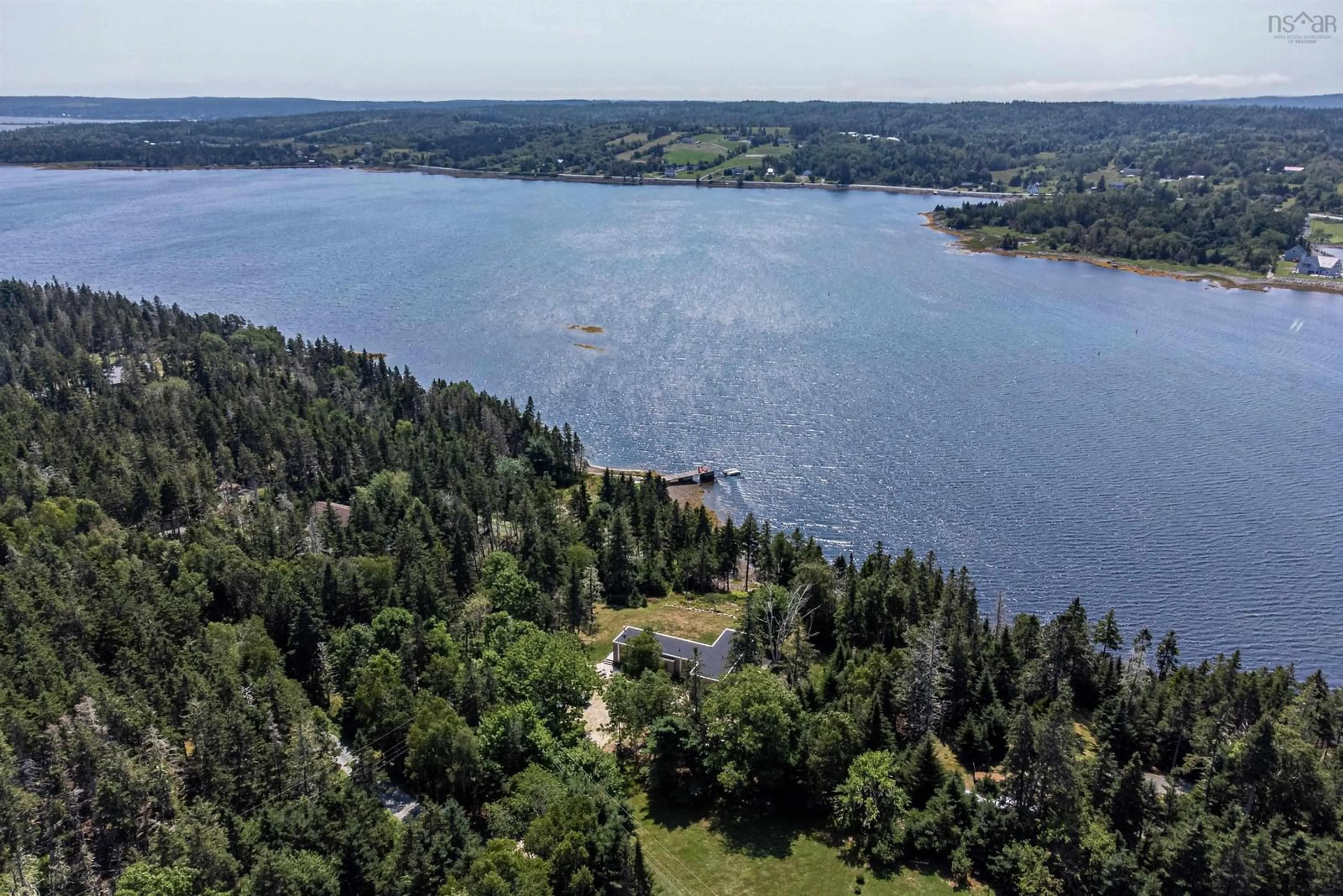 A pic from outside/outdoor area/front of a property/back of a property/a pic from drone, water/lake/river/ocean view for 143 South Cove Dr, Feltzen South Nova Scotia B0J 2X0