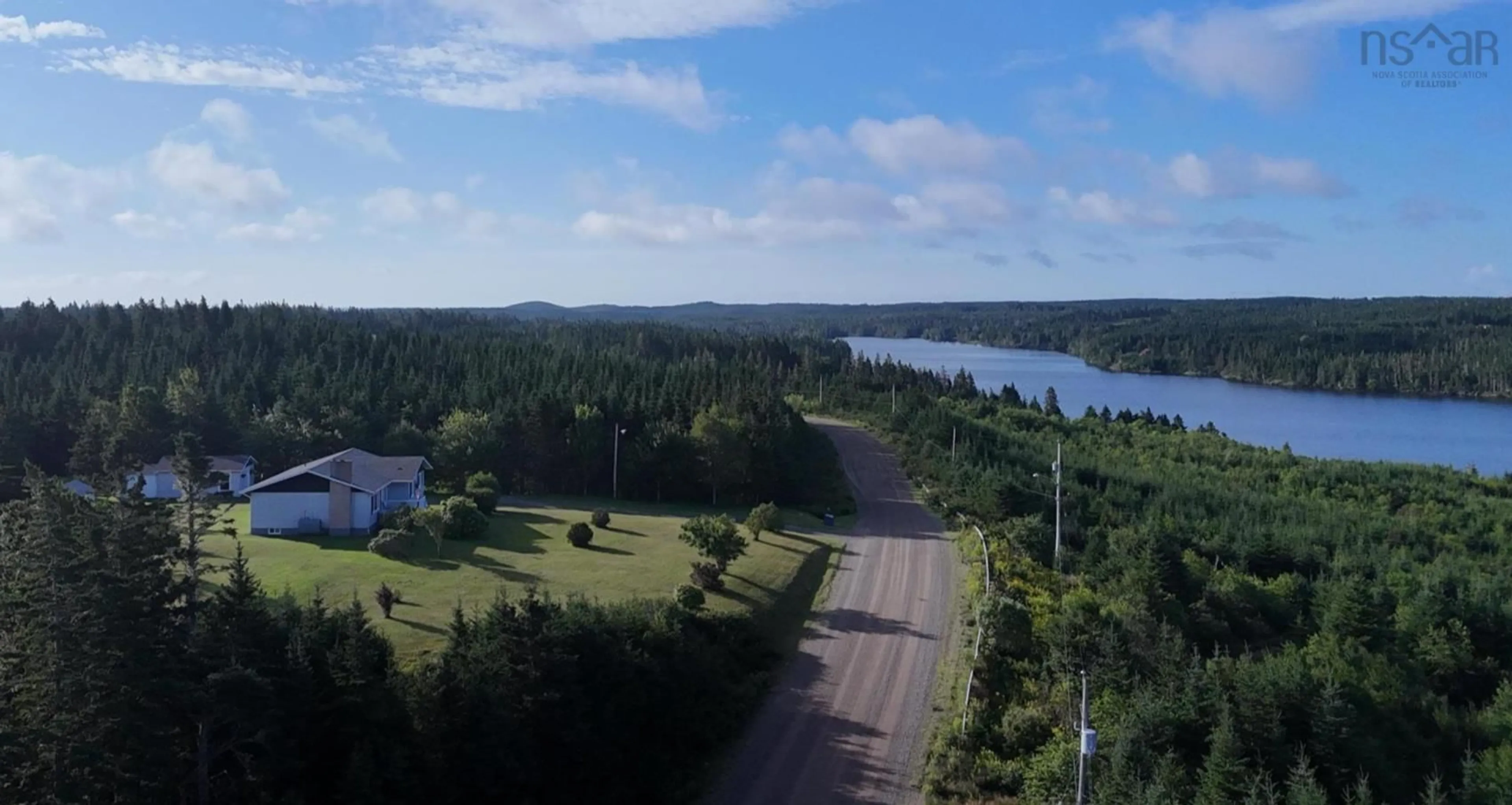 A pic from outside/outdoor area/front of a property/back of a property/a pic from drone, water/lake/river/ocean view for 131 East Side Grand River Rd, Grand River Nova Scotia B0E 1M0