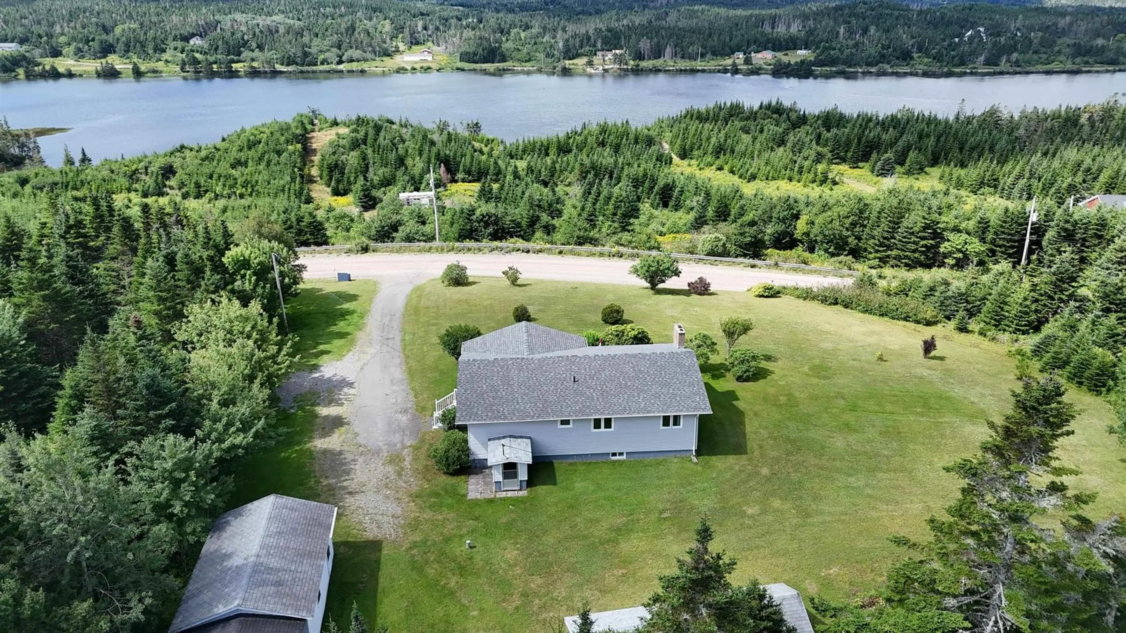 A pic from outside/outdoor area/front of a property/back of a property/a pic from drone, water/lake/river/ocean view for 131 East Side Grand River Rd, Grand River Nova Scotia B0E 1M0