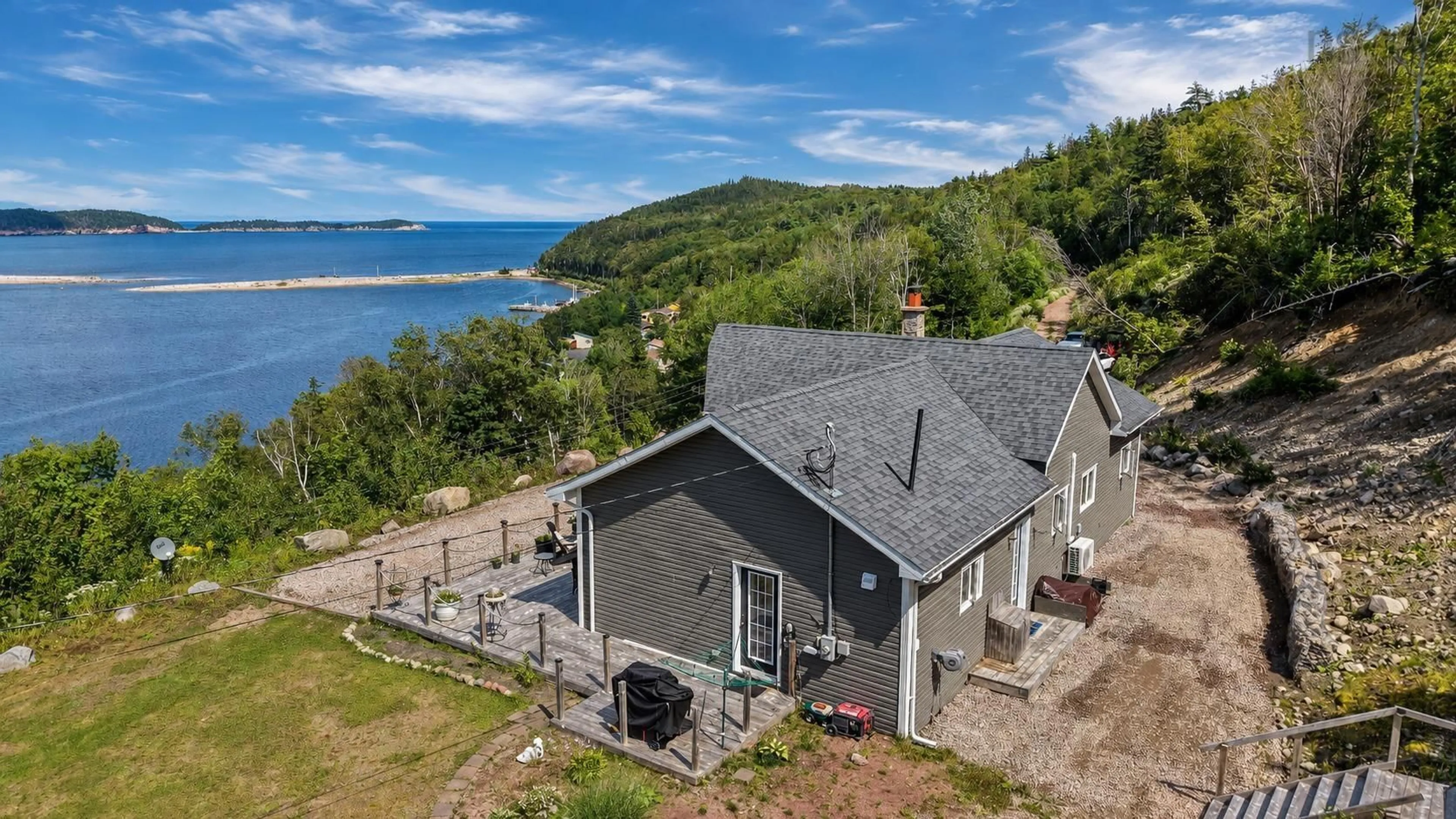 A pic from outside/outdoor area/front of a property/back of a property/a pic from drone, water/lake/river/ocean view for 39132 Cabot Trail, Ingonish Ferry Nova Scotia B0C 1L0