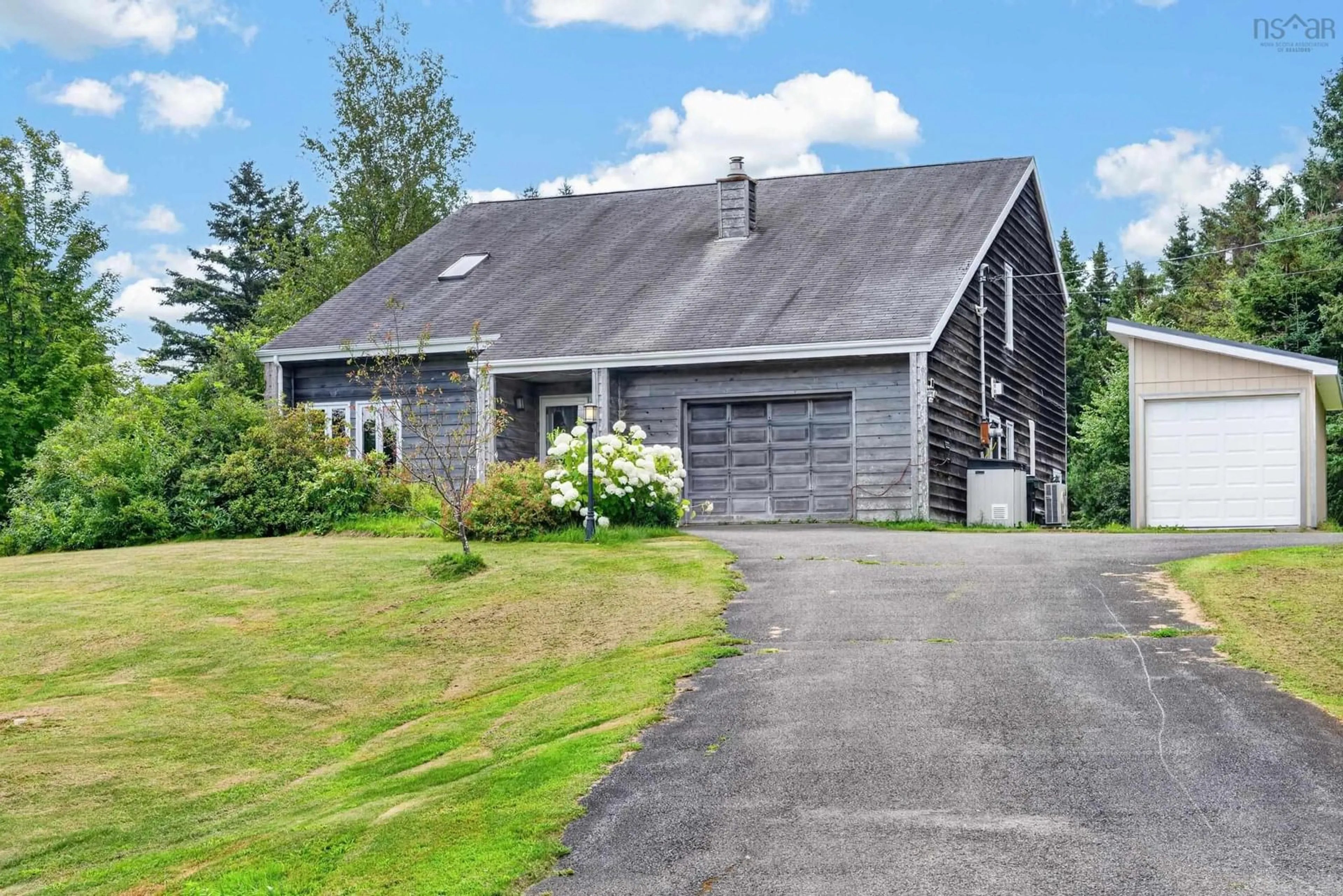 A pic from outside/outdoor area/front of a property/back of a property/a pic from drone, street for 9 Poushay Dr, Coxheath Nova Scotia B1L 1B4