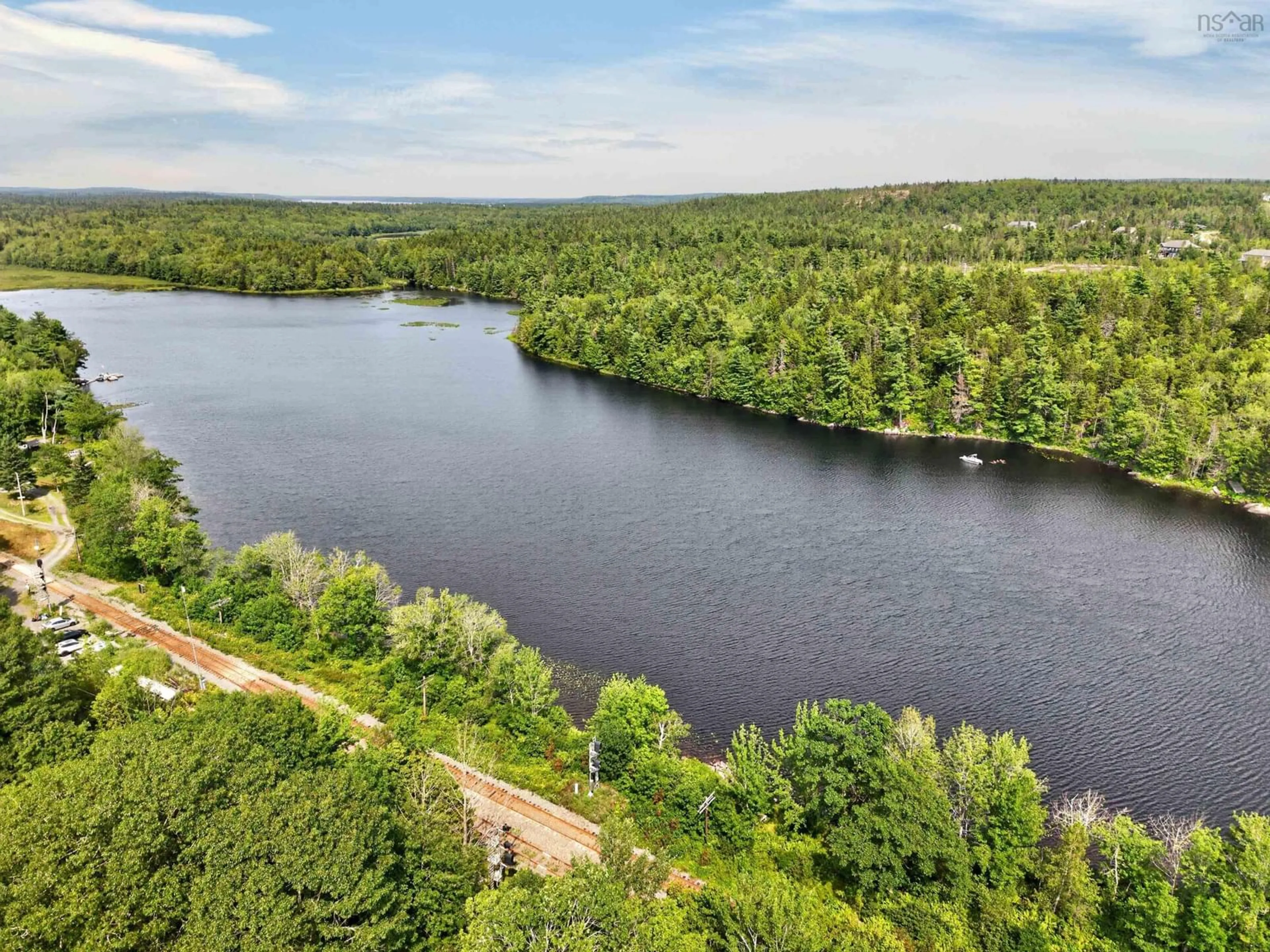A pic from outside/outdoor area/front of a property/back of a property/a pic from drone, water/lake/river/ocean view for 3 Station Rd, Kinsac Nova Scotia B4G 1C8