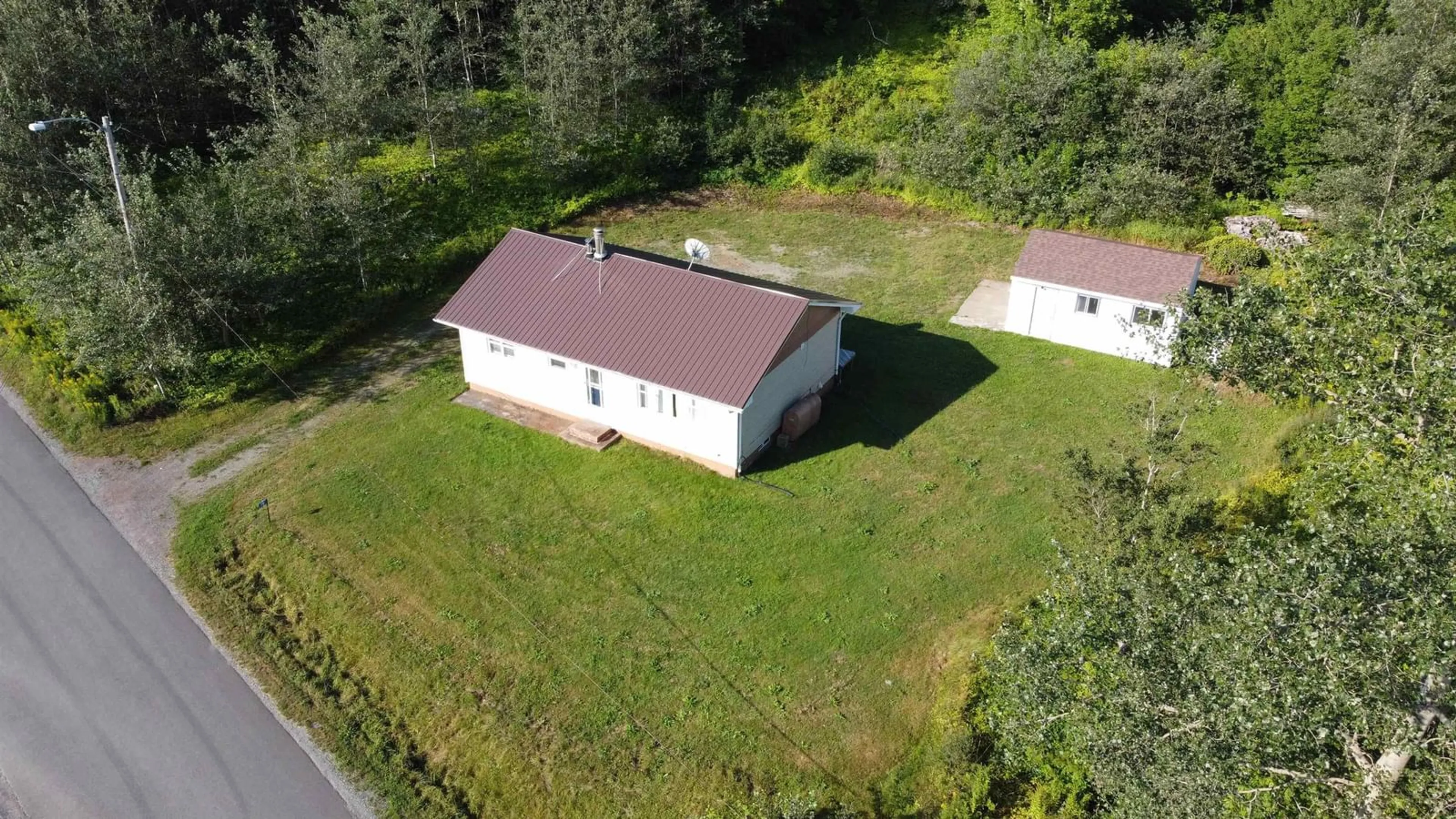 A pic from outside/outdoor area/front of a property/back of a property/a pic from drone, building for Meadow Brook Hill #79, Mulgrave Nova Scotia B0E 2G0