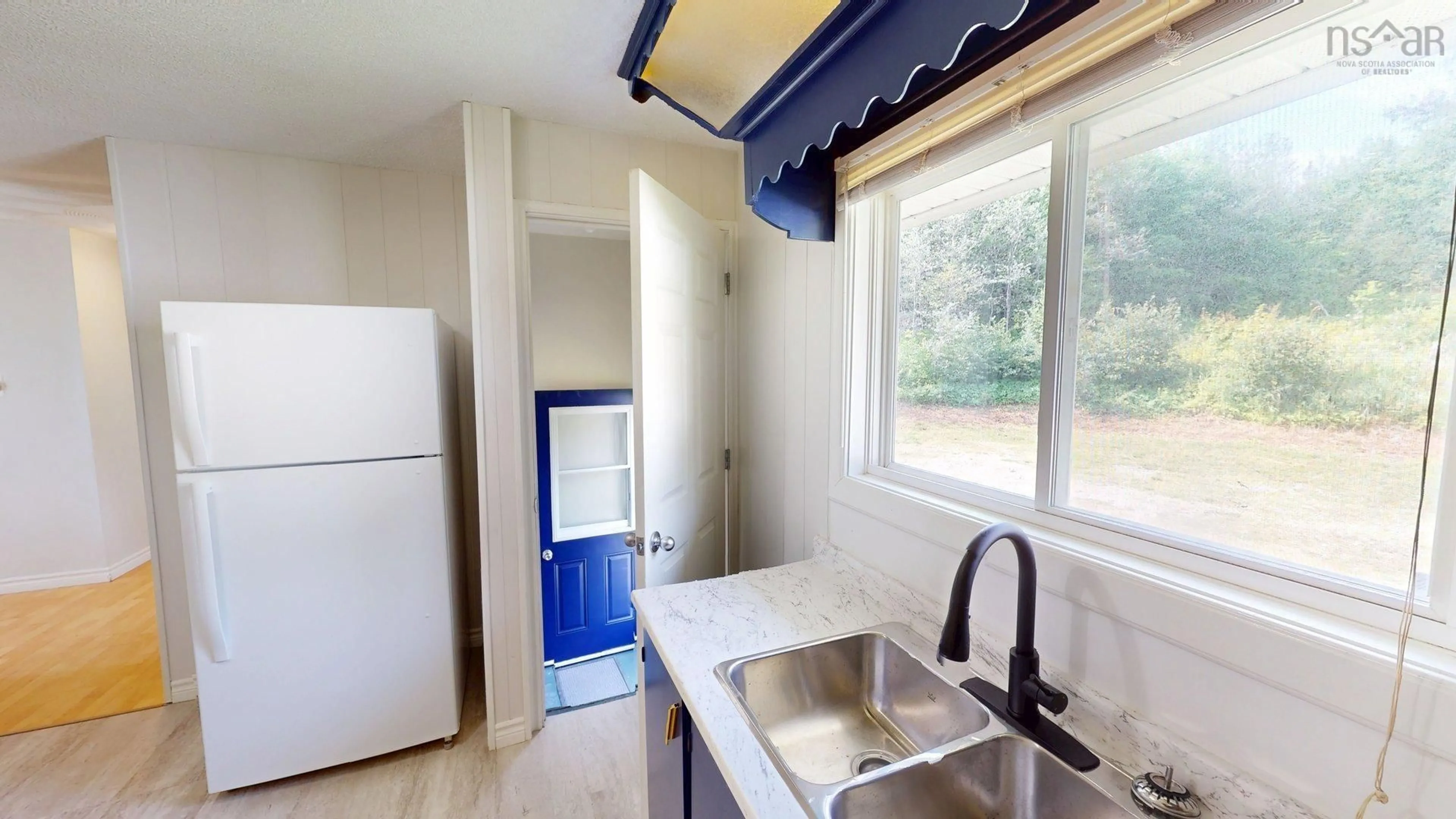 Standard kitchen, ceramic/tile floor for Meadow Brook Hill #79, Mulgrave Nova Scotia B0E 2G0
