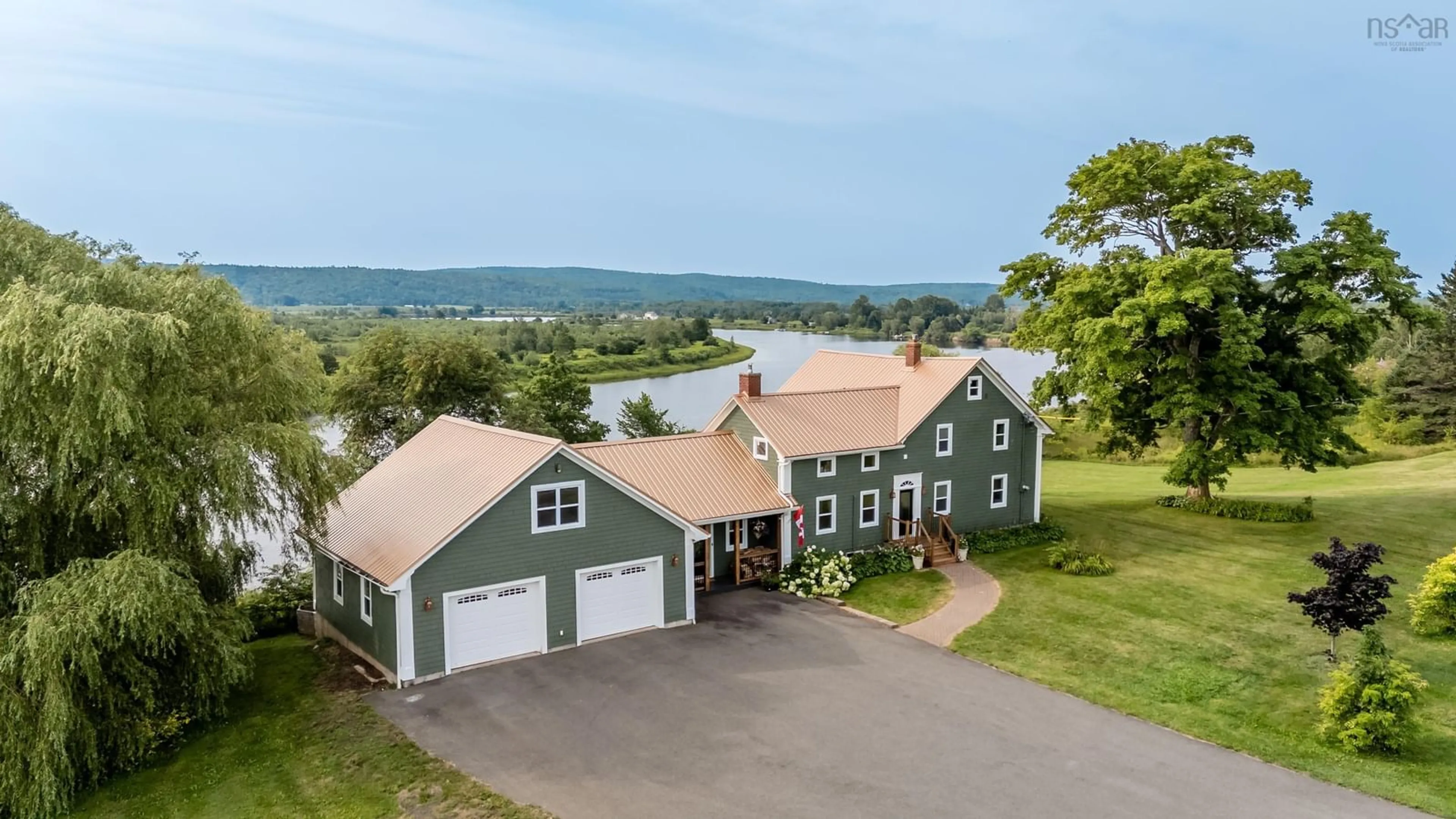 A pic from outside/outdoor area/front of a property/back of a property/a pic from drone, water/lake/river/ocean view for 7772 Highway 1, Upper Granville Nova Scotia B0S 1A0