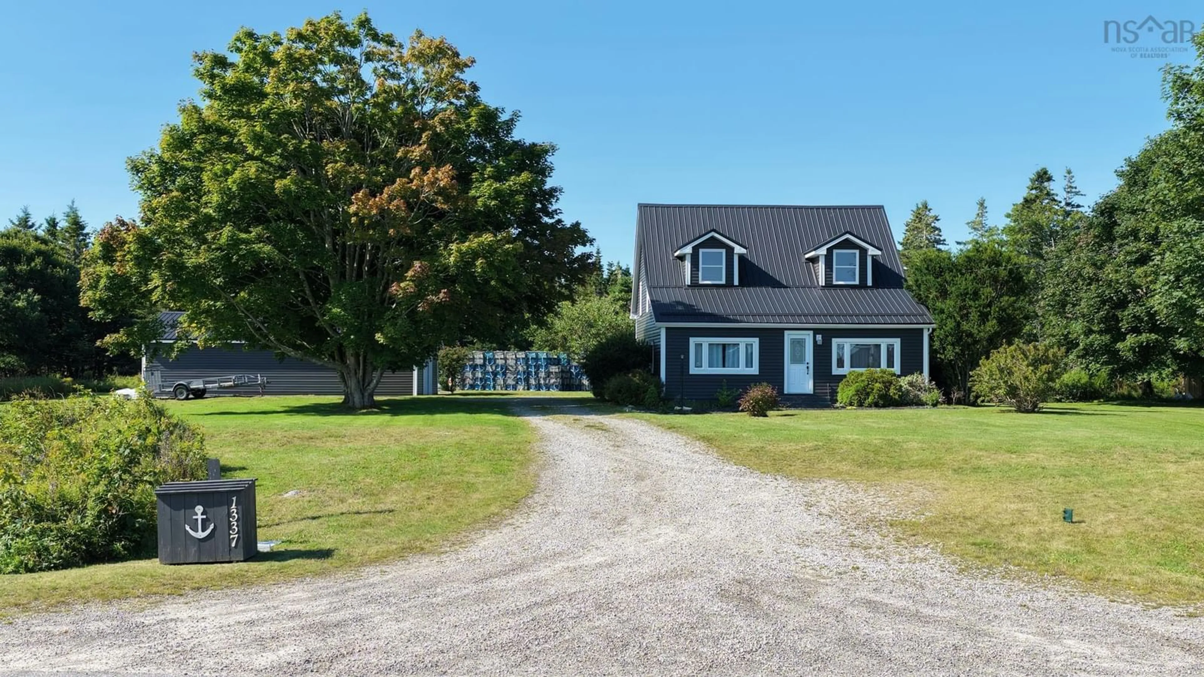 A pic from outside/outdoor area/front of a property/back of a property/a pic from drone, water/lake/river/ocean view for Highway 33- Mcgray #1337, Centreville Nova Scotia B0W 2G0