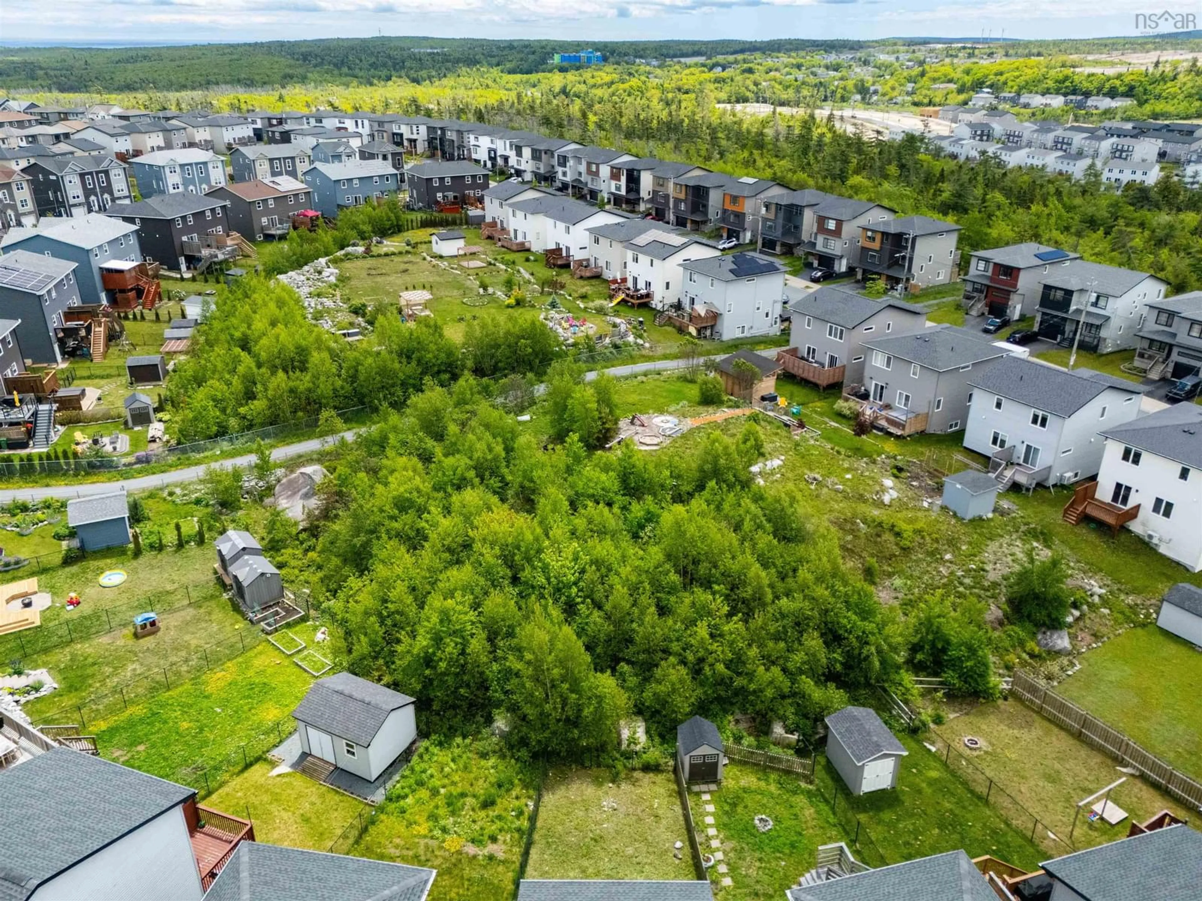 A pic from outside/outdoor area/front of a property/back of a property/a pic from drone, forest/trees view for 27 Onyx Cres, Halifax Nova Scotia B3P 0H5