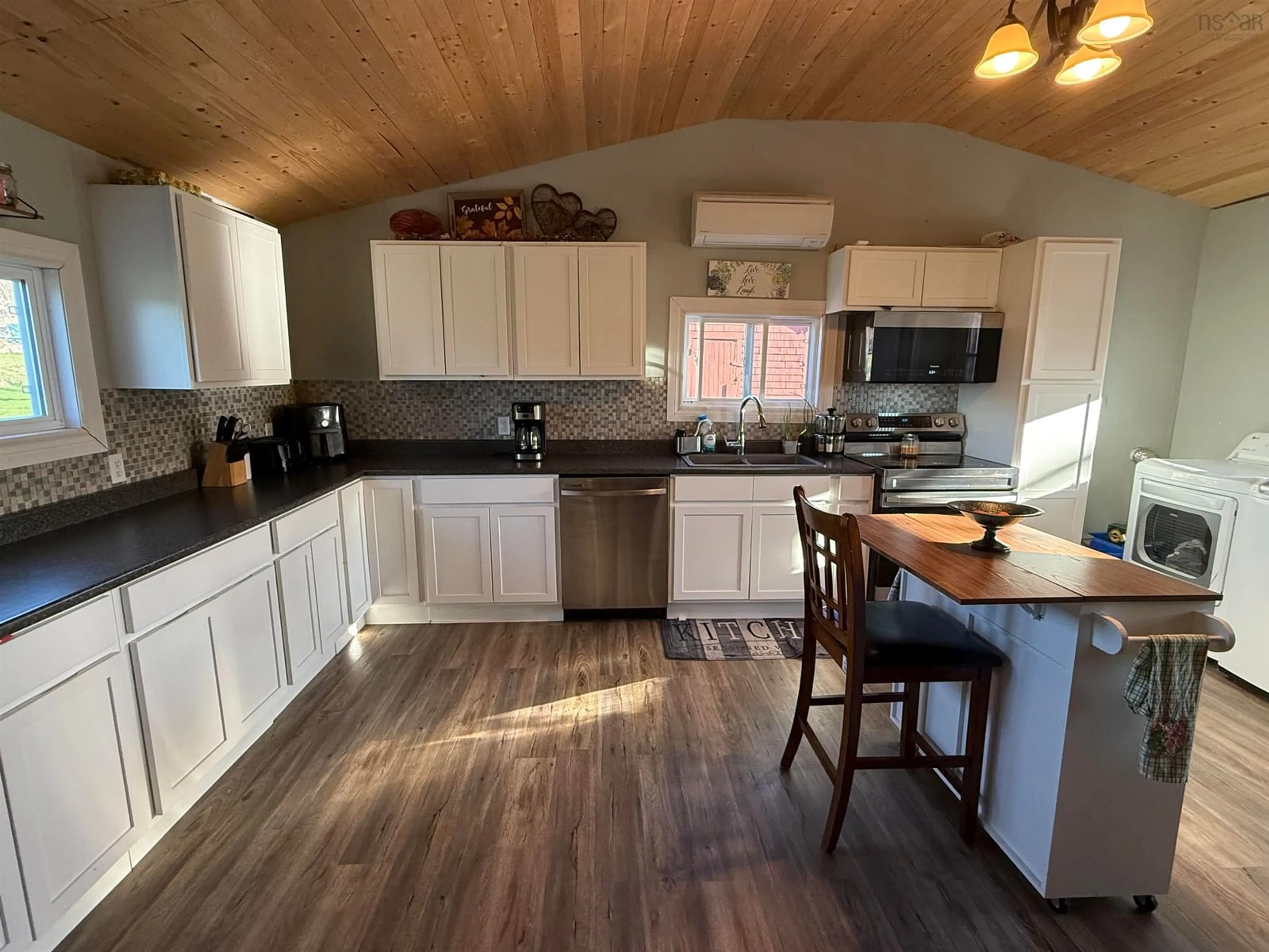 Open concept kitchen, wood/laminate floor for 10250 Highway 4, Broadway Nova Scotia B0K 1G0