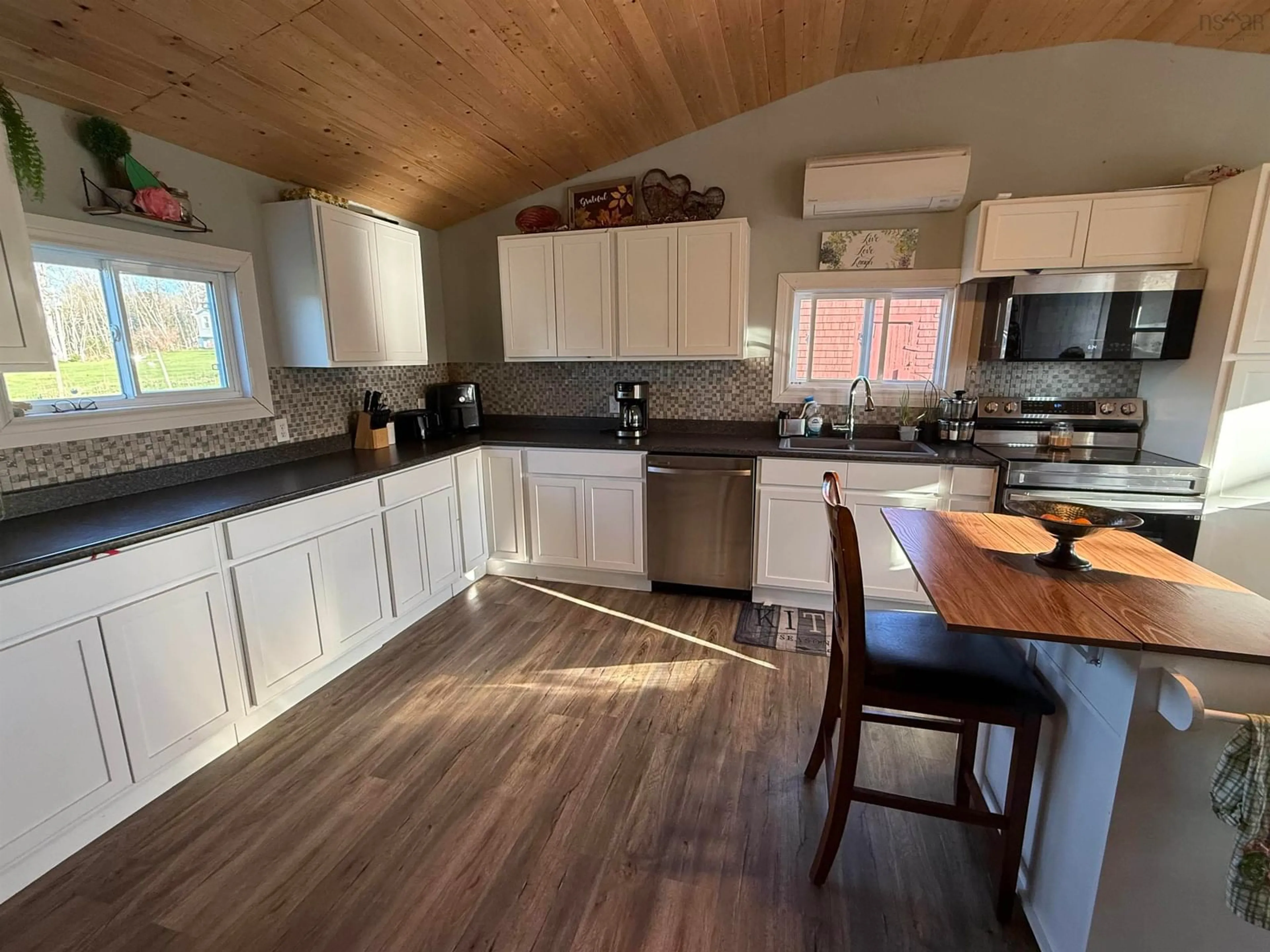 Open concept kitchen, wood/laminate floor for 10250 Highway 4, Broadway Nova Scotia B0K 1G0
