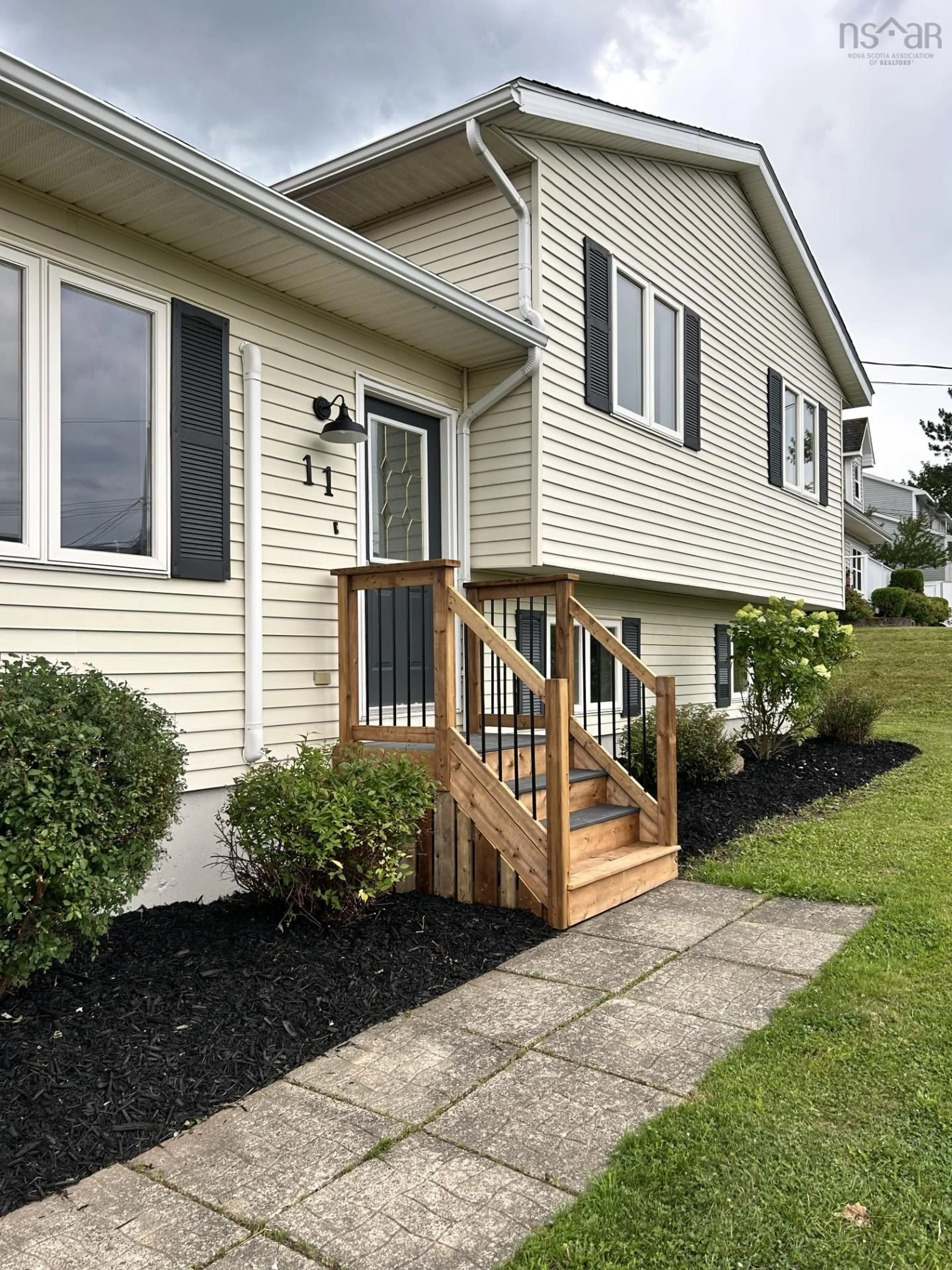 Home with vinyl exterior material, street for 11 Heritage Dr, West River Nova Scotia B2G 2T5