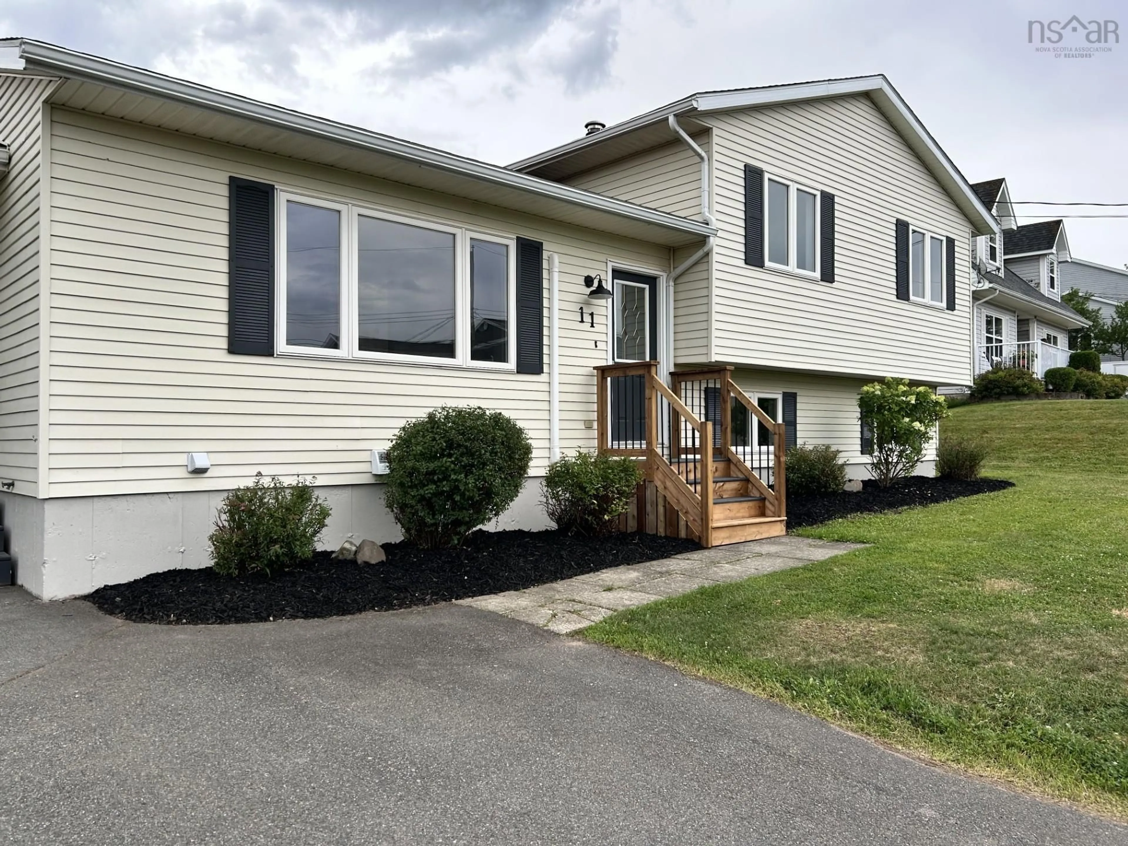 Home with vinyl exterior material, street for 11 Heritage Dr, West River Nova Scotia B2G 2T5