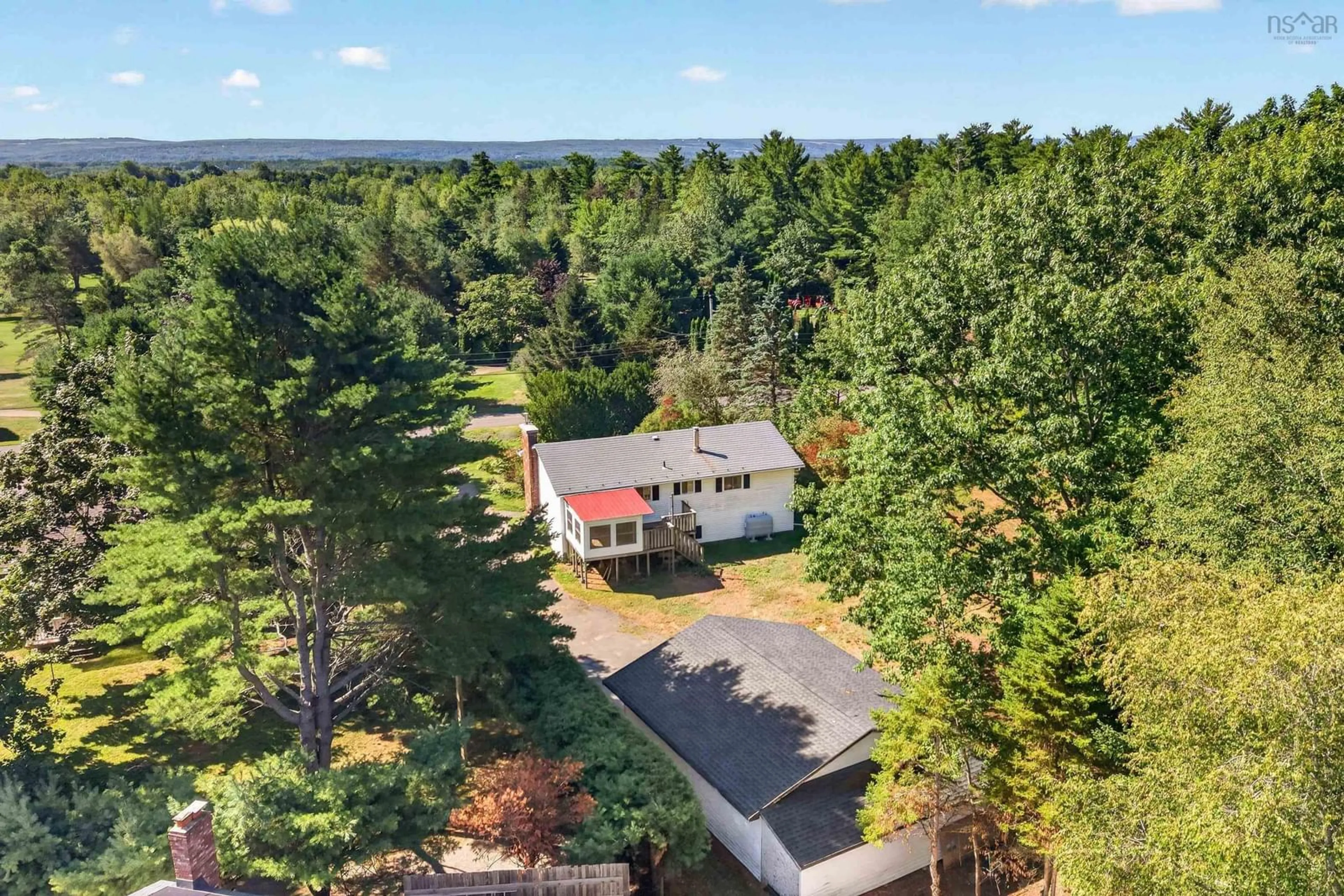 A pic from outside/outdoor area/front of a property/back of a property/a pic from drone, forest/trees view for 171 Saxon St, Centreville Nova Scotia B0P 1J0