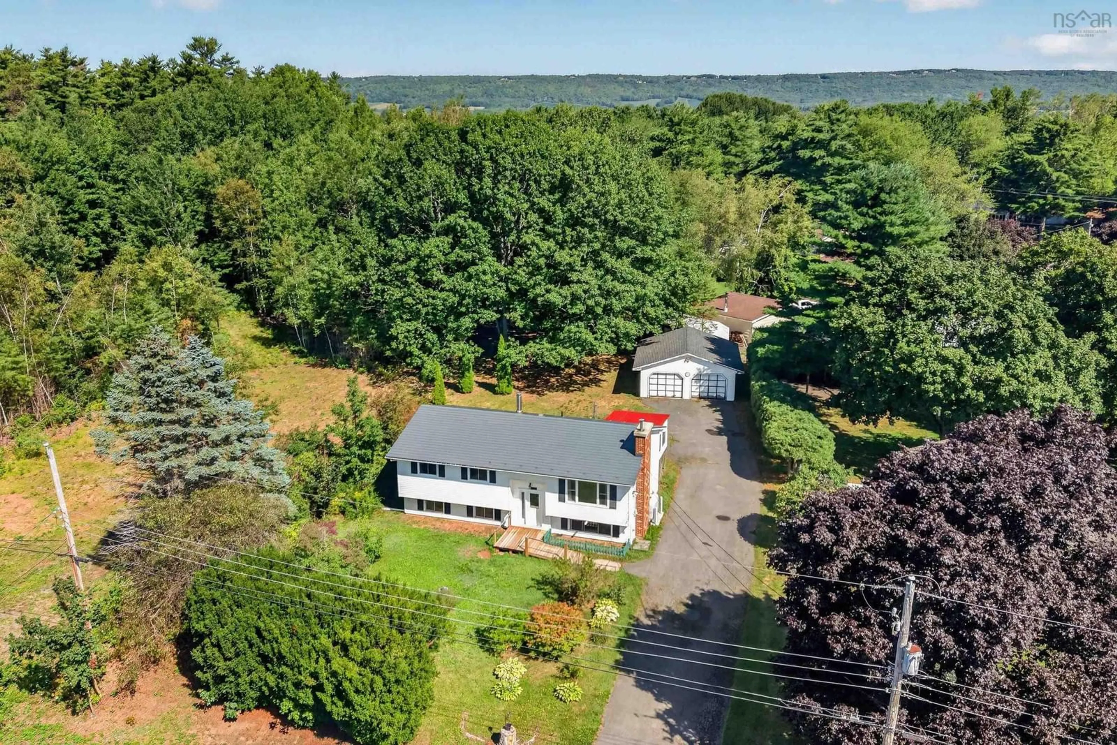 A pic from outside/outdoor area/front of a property/back of a property/a pic from drone, water/lake/river/ocean view for 171 Saxon St, Centreville Nova Scotia B0P 1J0