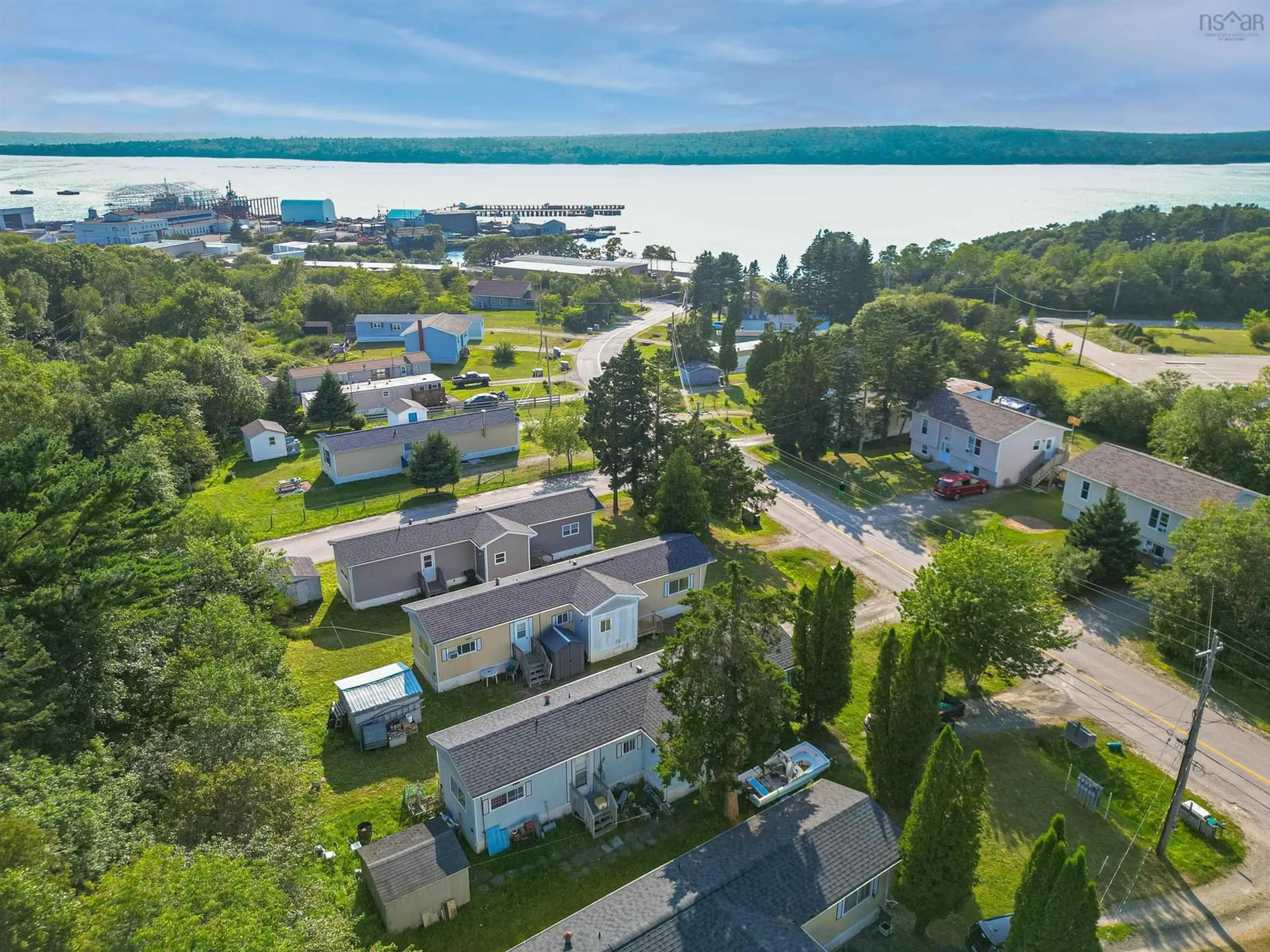 A pic from outside/outdoor area/front of a property/back of a property/a pic from drone, water/lake/river/ocean view for Commission St, Sandy Point Nova Scotia B0T 1W0