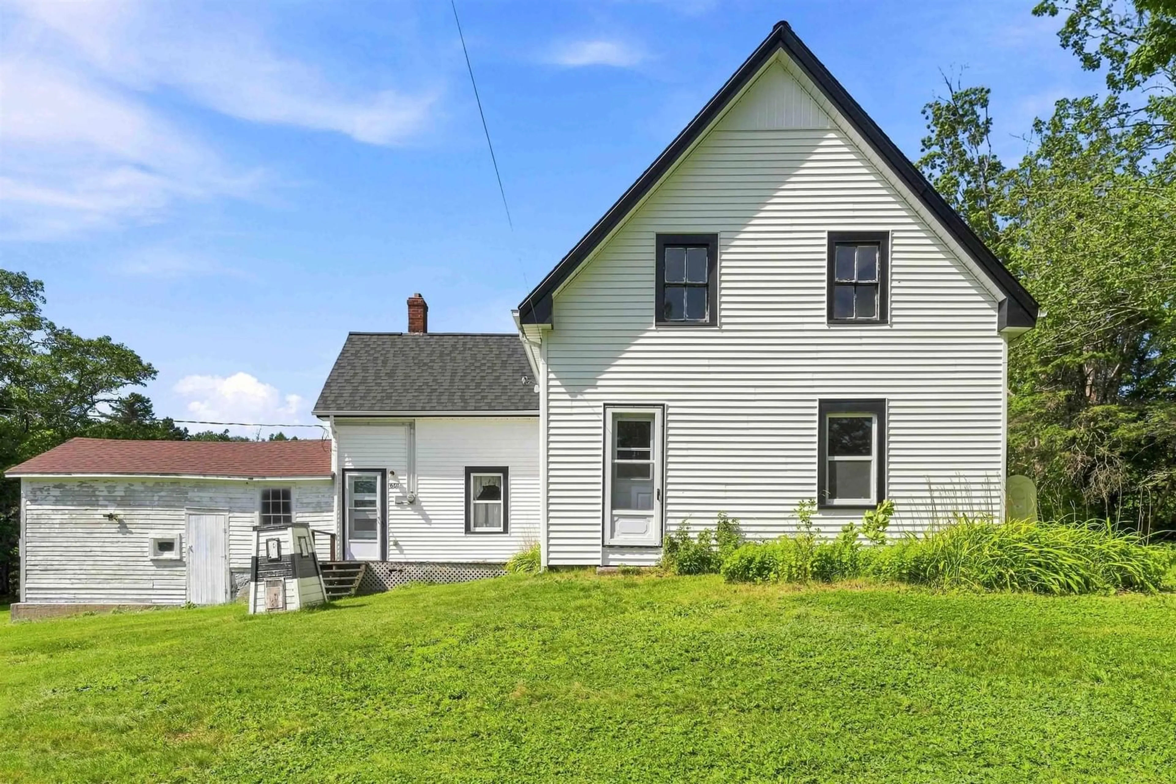 Home with vinyl exterior material, street for 601 Seaman St, East Margaretsville Nova Scotia B0S 1N0