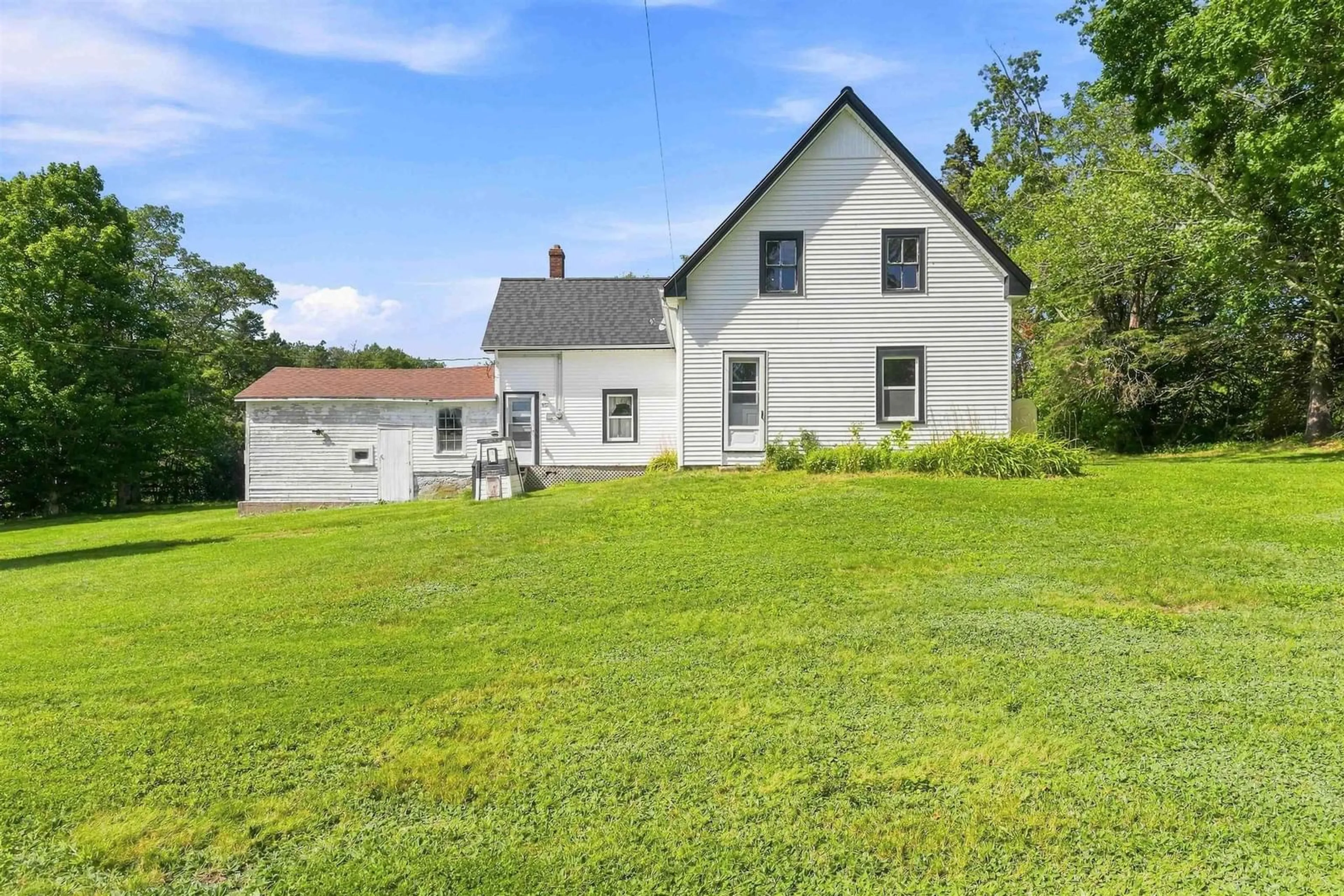 A pic from outside/outdoor area/front of a property/back of a property/a pic from drone, unknown for 601 Seaman St, East Margaretsville Nova Scotia B0S 1N0