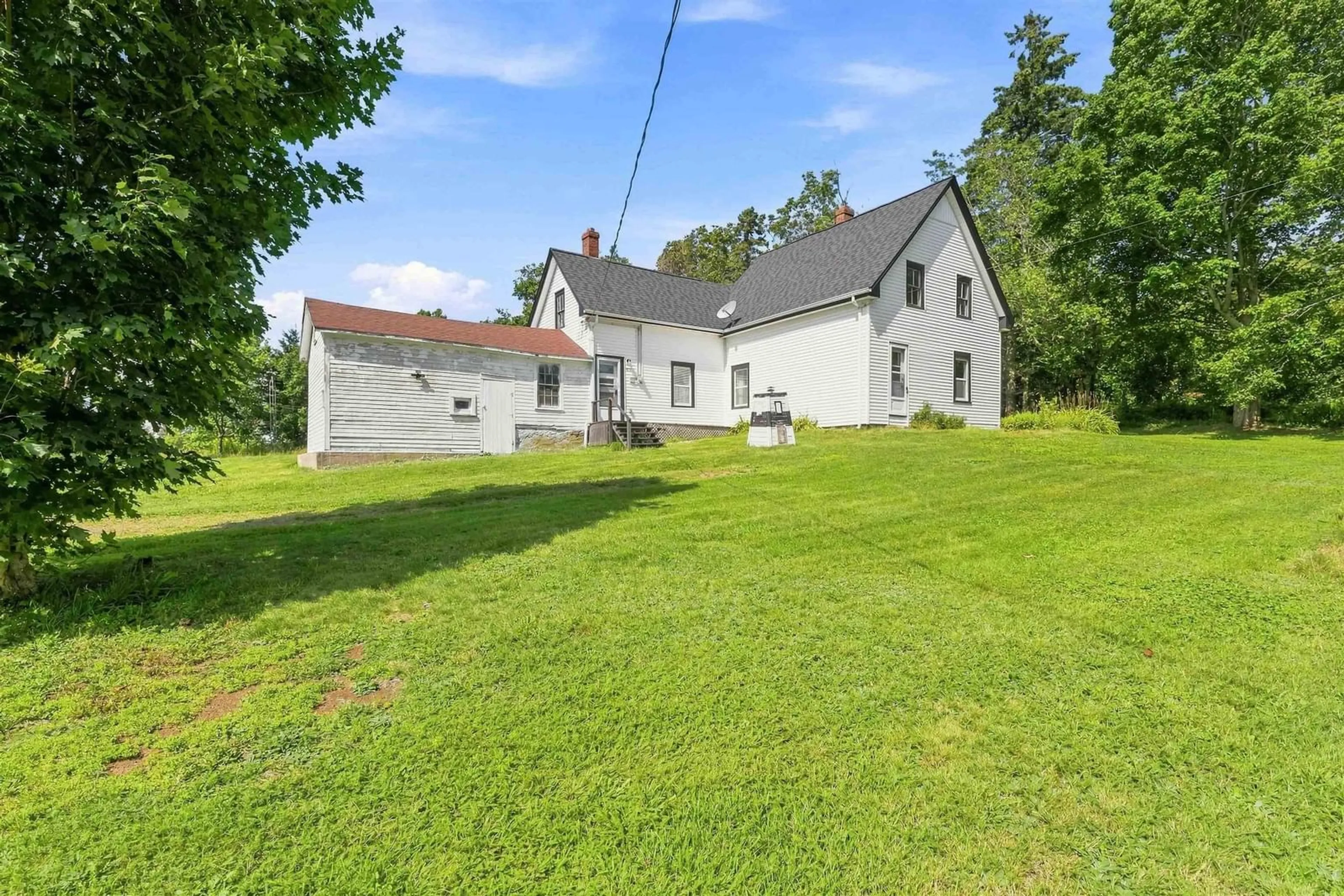 A pic from outside/outdoor area/front of a property/back of a property/a pic from drone, unknown for 601 Seaman St, East Margaretsville Nova Scotia B0S 1N0