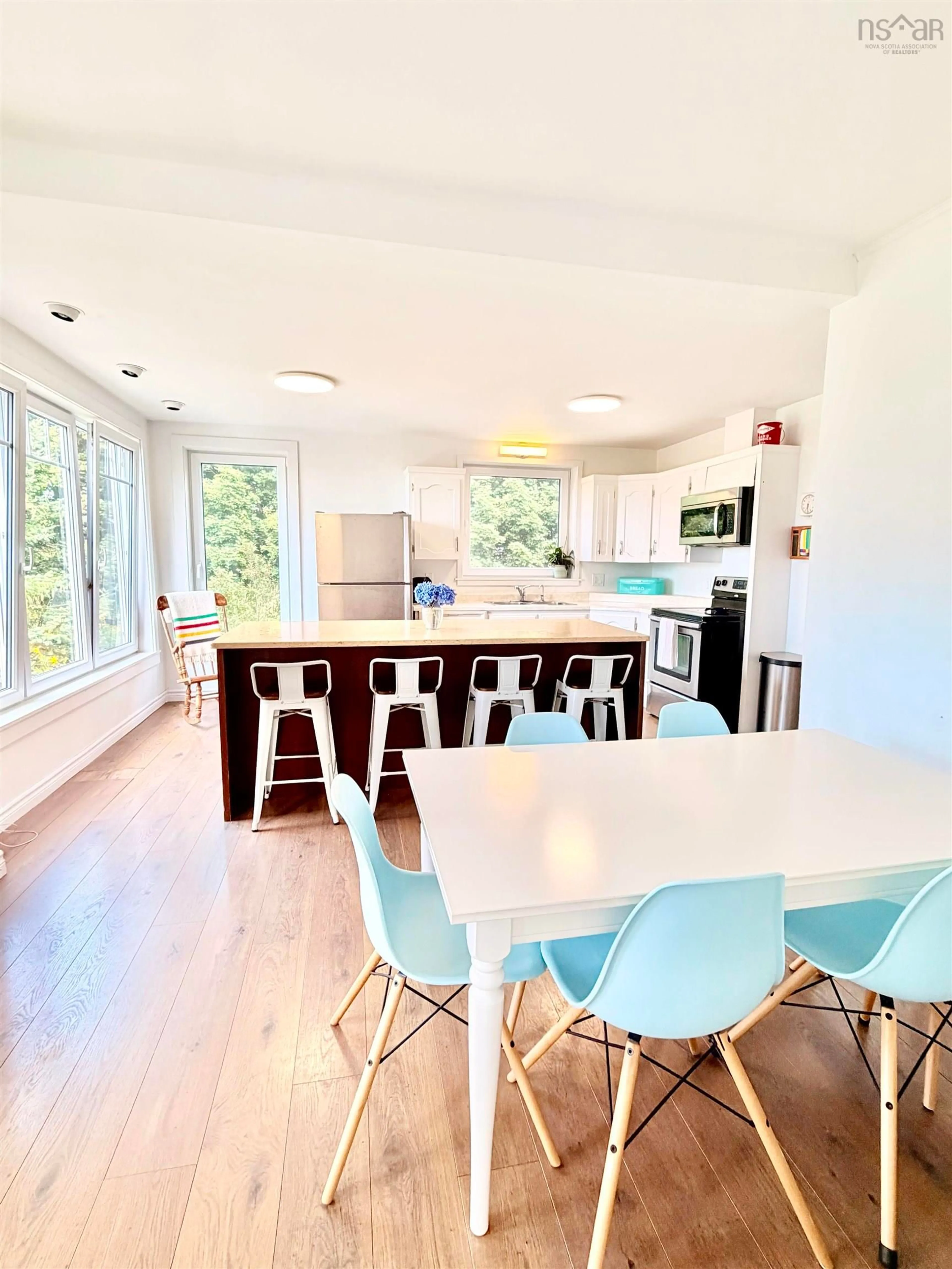 Open concept kitchen, wood/laminate floor for 15 Church St, Inverness Nova Scotia B0E 1N0