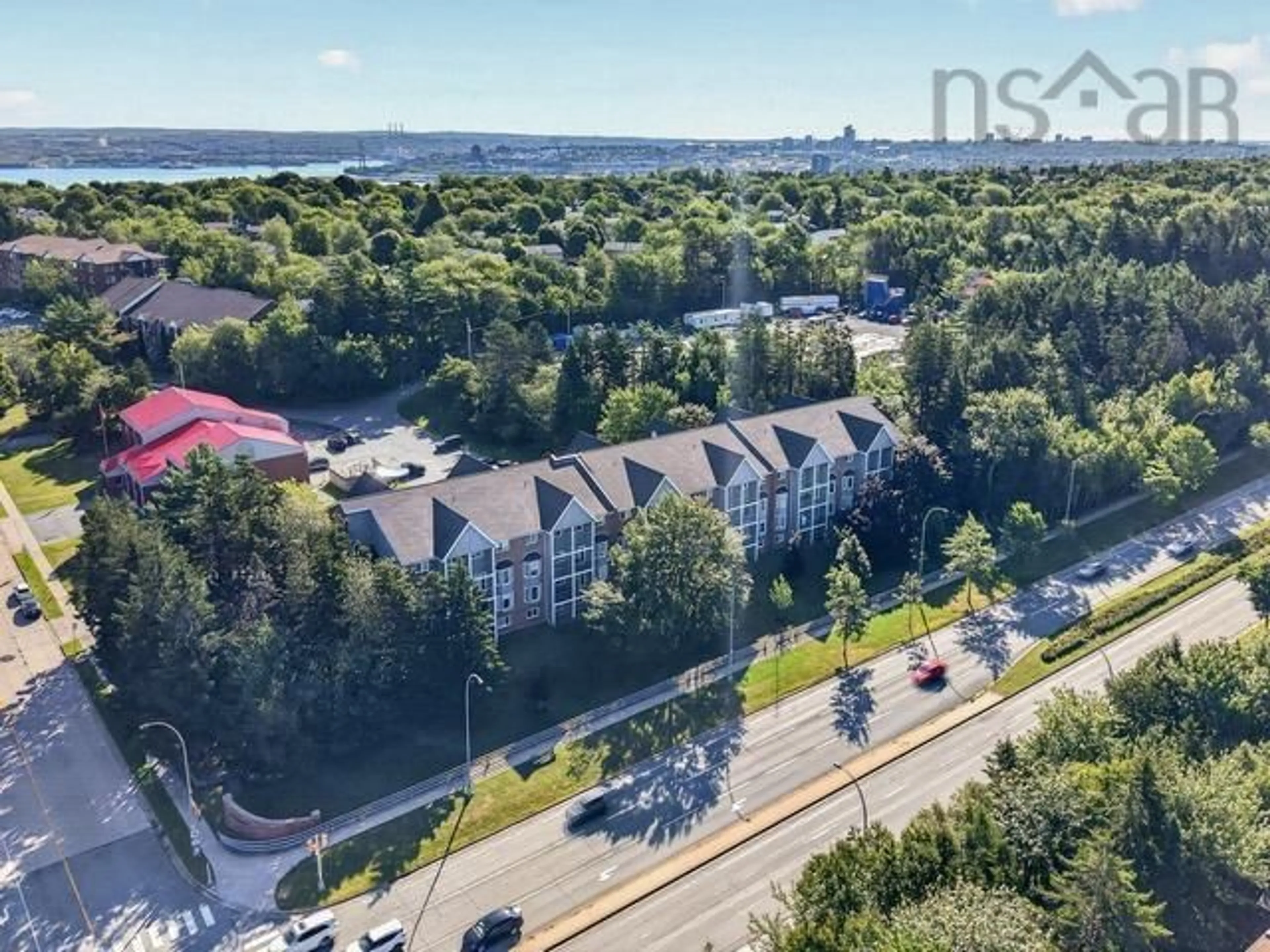 A pic from outside/outdoor area/front of a property/back of a property/a pic from drone, water/lake/river/ocean view for 15 Knightsridge Dr #201, Clayton Park Nova Scotia B3M 3S9