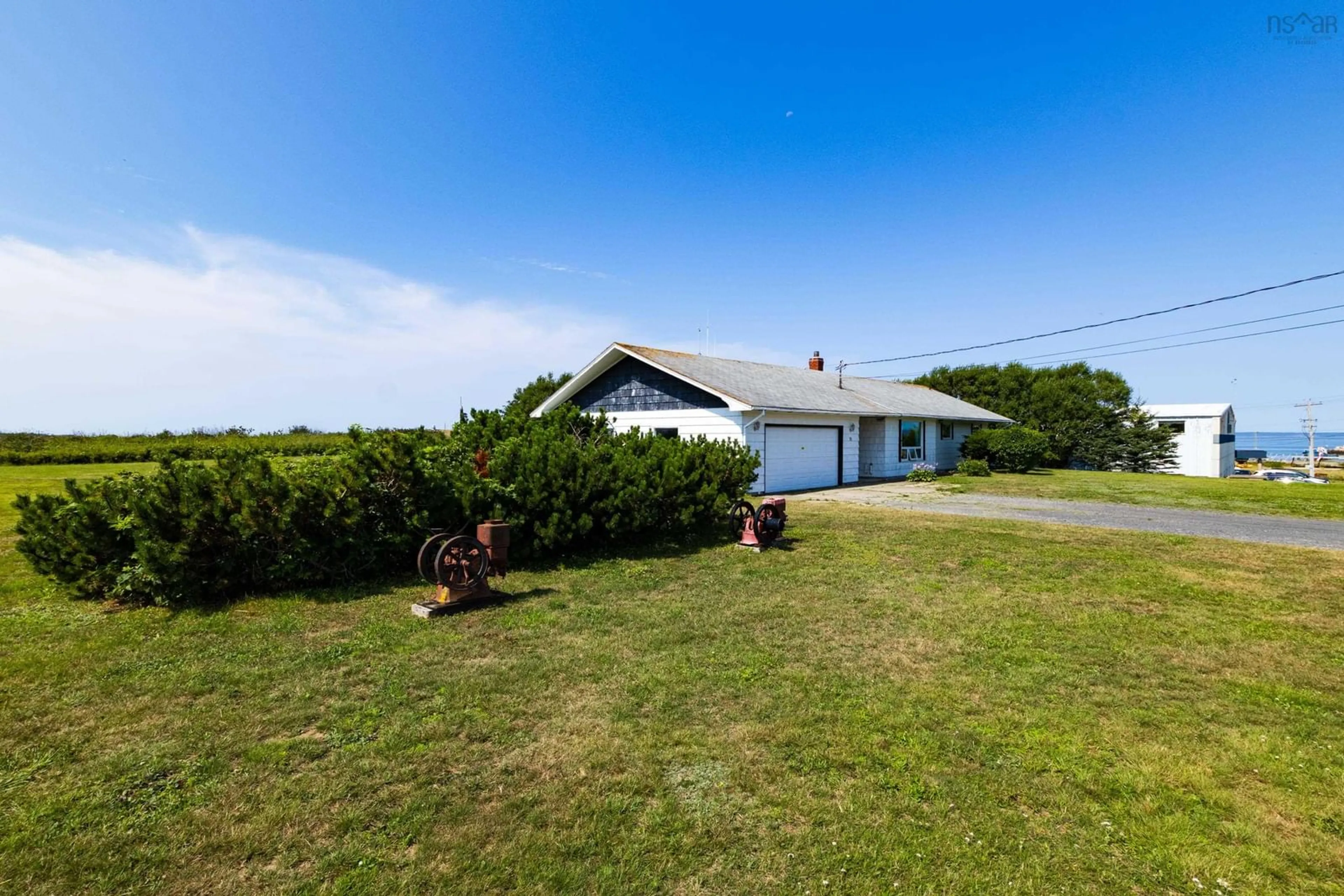 A pic from outside/outdoor area/front of a property/back of a property/a pic from drone, water/lake/river/ocean view for 76 Saulnierville Wharf Rd, Saulnierville Nova Scotia B0W 2Z0