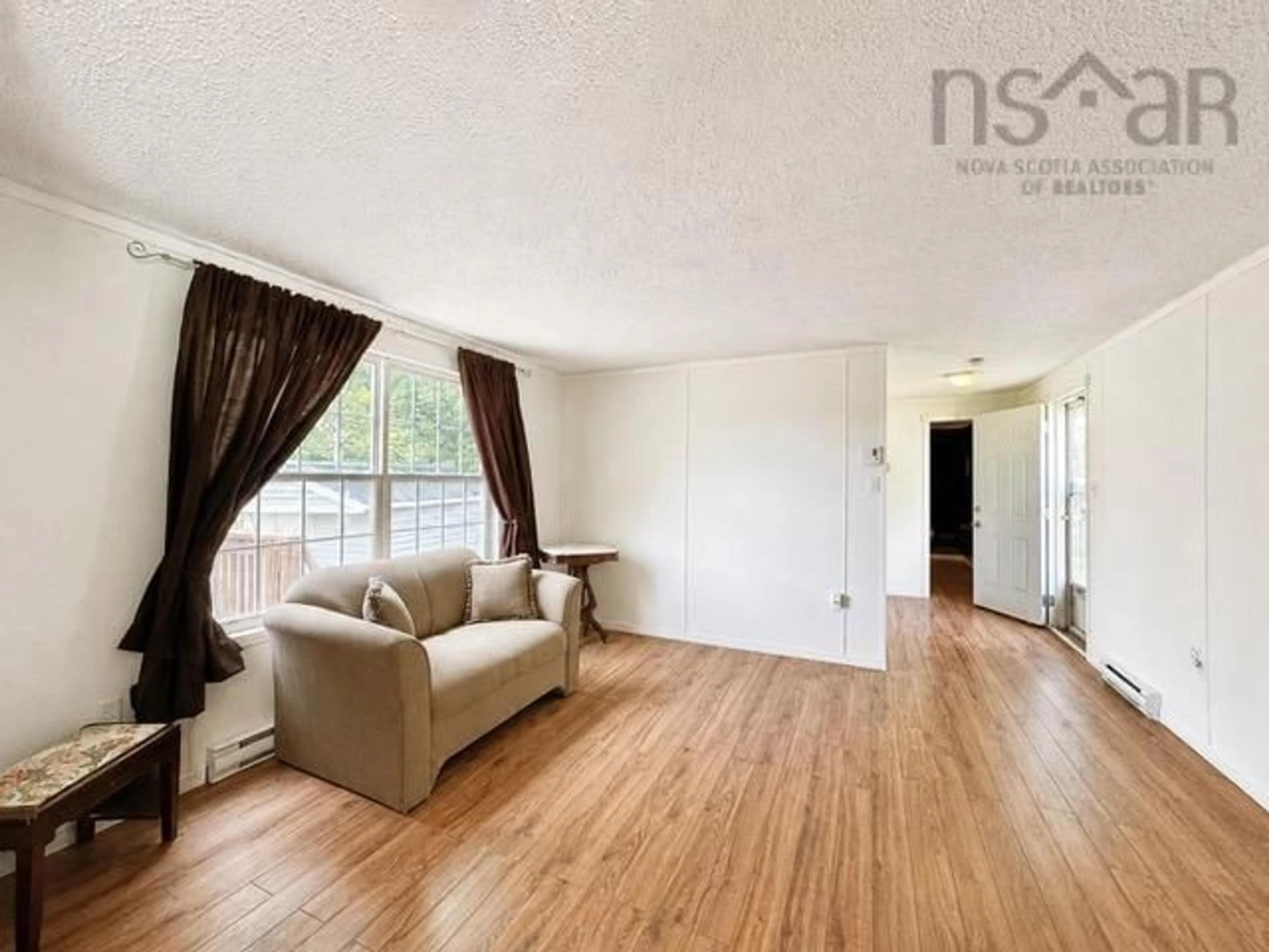 Living room with furniture, wood/laminate floor for 1140 Susan Dr, Beaver Bank Nova Scotia B4E 1P1