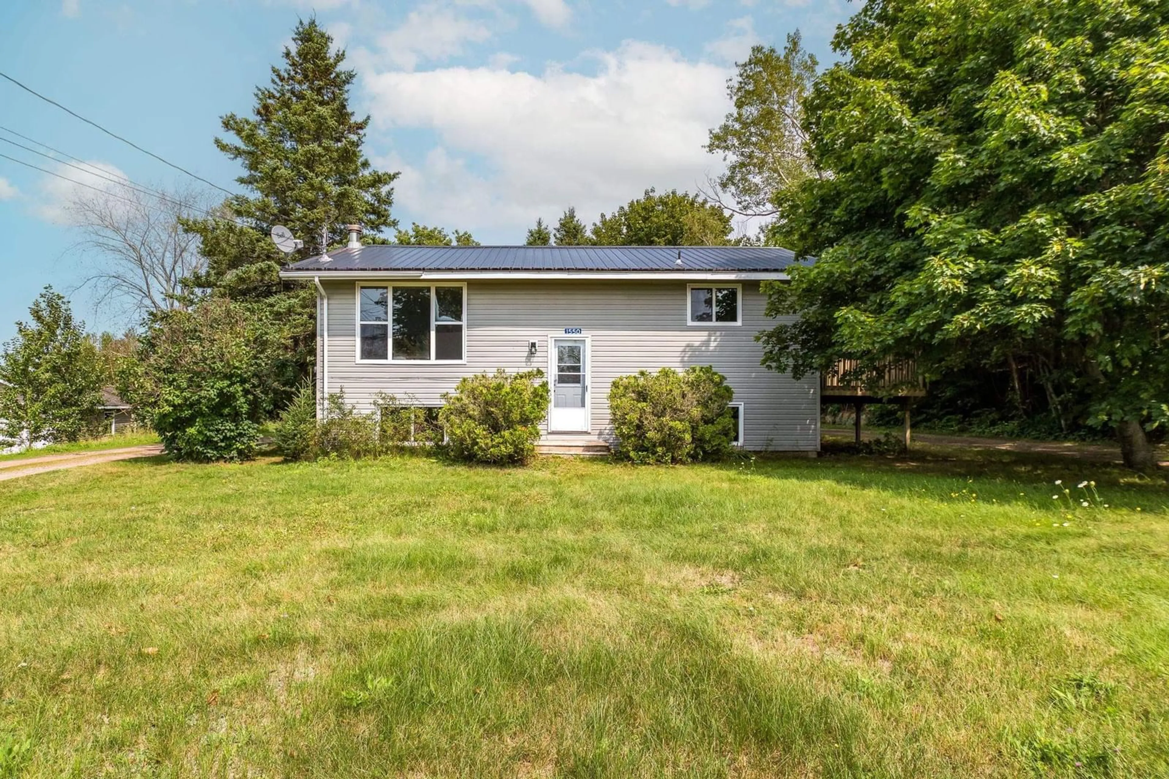 Home with vinyl exterior material, street for 1550 Highway 358, Port Williams Nova Scotia B0P 1T0