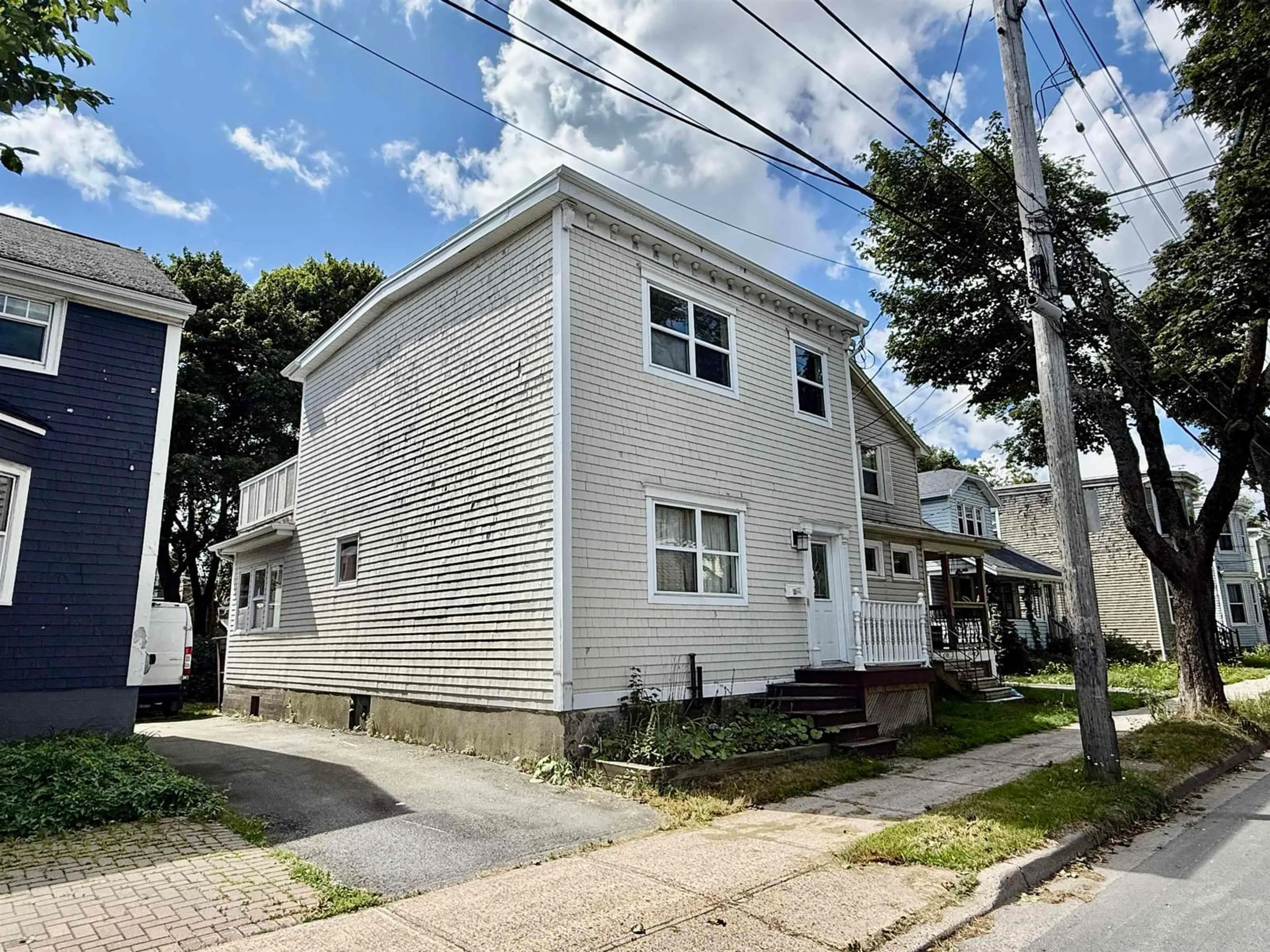 A pic from outside/outdoor area/front of a property/back of a property/a pic from drone, street for 6312 Chebucto Rd, Halifax Nova Scotia B3L 1K8