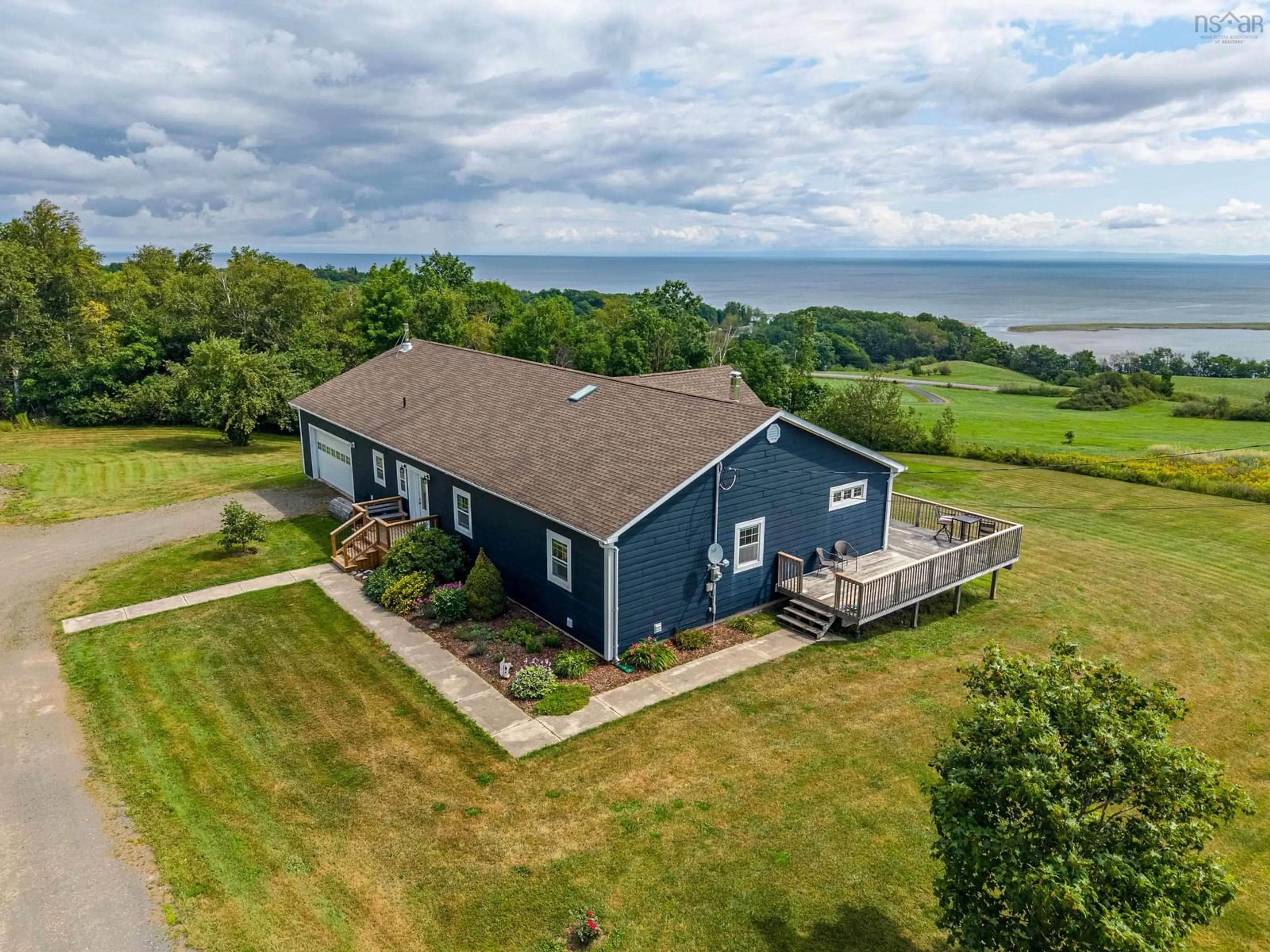 A pic from outside/outdoor area/front of a property/back of a property/a pic from drone, water/lake/river/ocean view for Hammer Mountain Rd #92, Harbour Centre Nova Scotia B2G 2L2