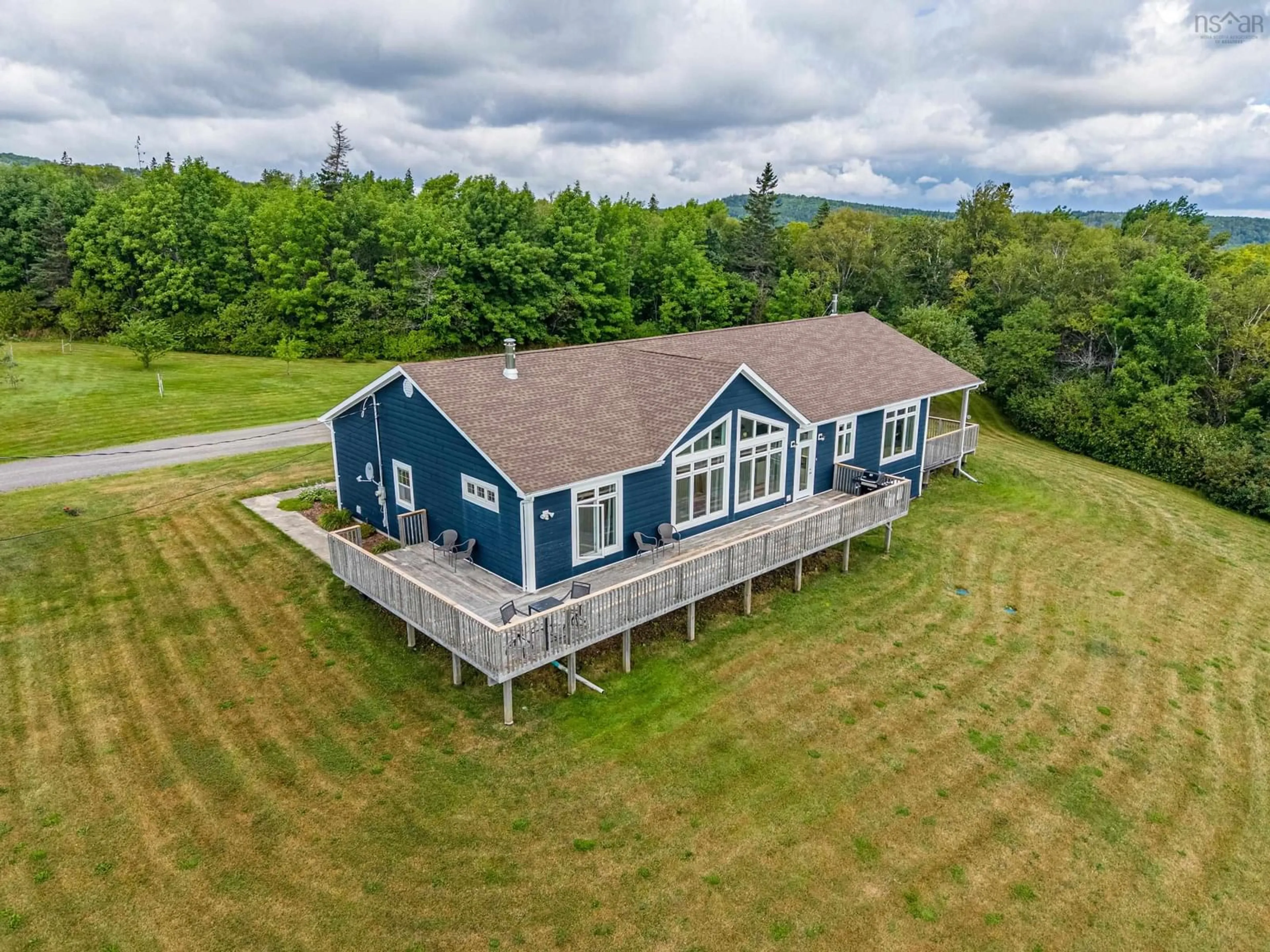 A pic from outside/outdoor area/front of a property/back of a property/a pic from drone, water/lake/river/ocean view for Hammer Mountain Rd #92, Harbour Centre Nova Scotia B2G 2L2