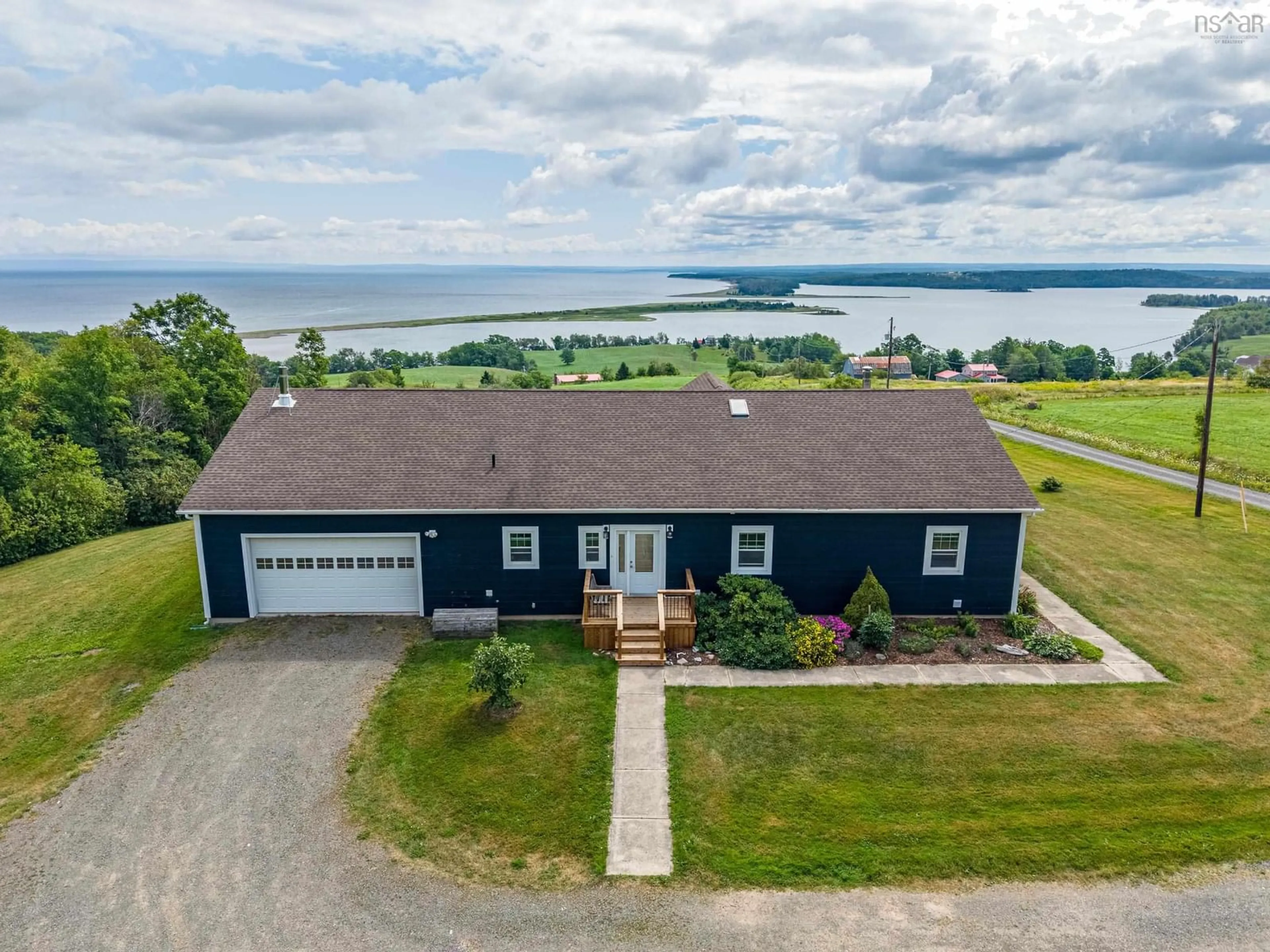 A pic from outside/outdoor area/front of a property/back of a property/a pic from drone, water/lake/river/ocean view for Hammer Mountain Rd #92, Harbour Centre Nova Scotia B2G 2L2