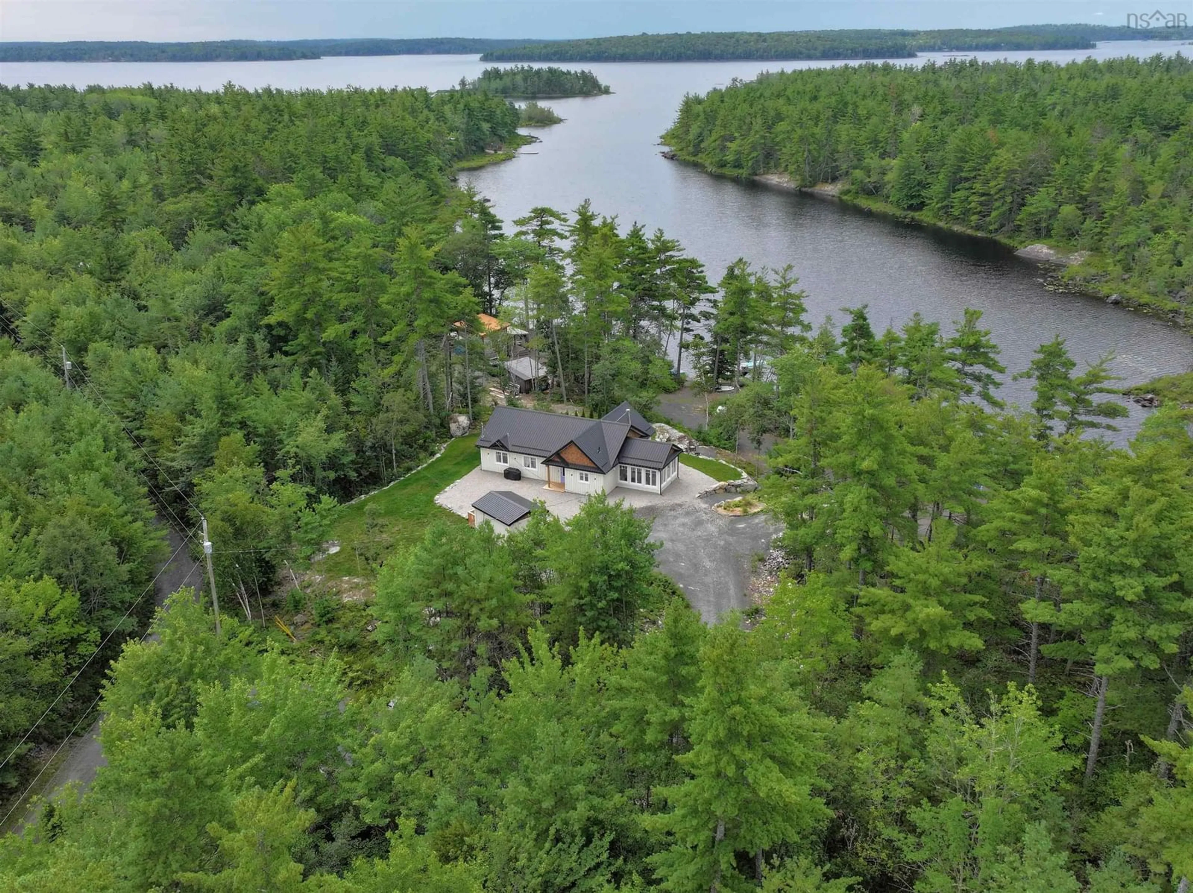 A pic from outside/outdoor area/front of a property/back of a property/a pic from drone, water/lake/river/ocean view for 89 Mint Brook Rd, Molega North Nova Scotia B0T 1X0