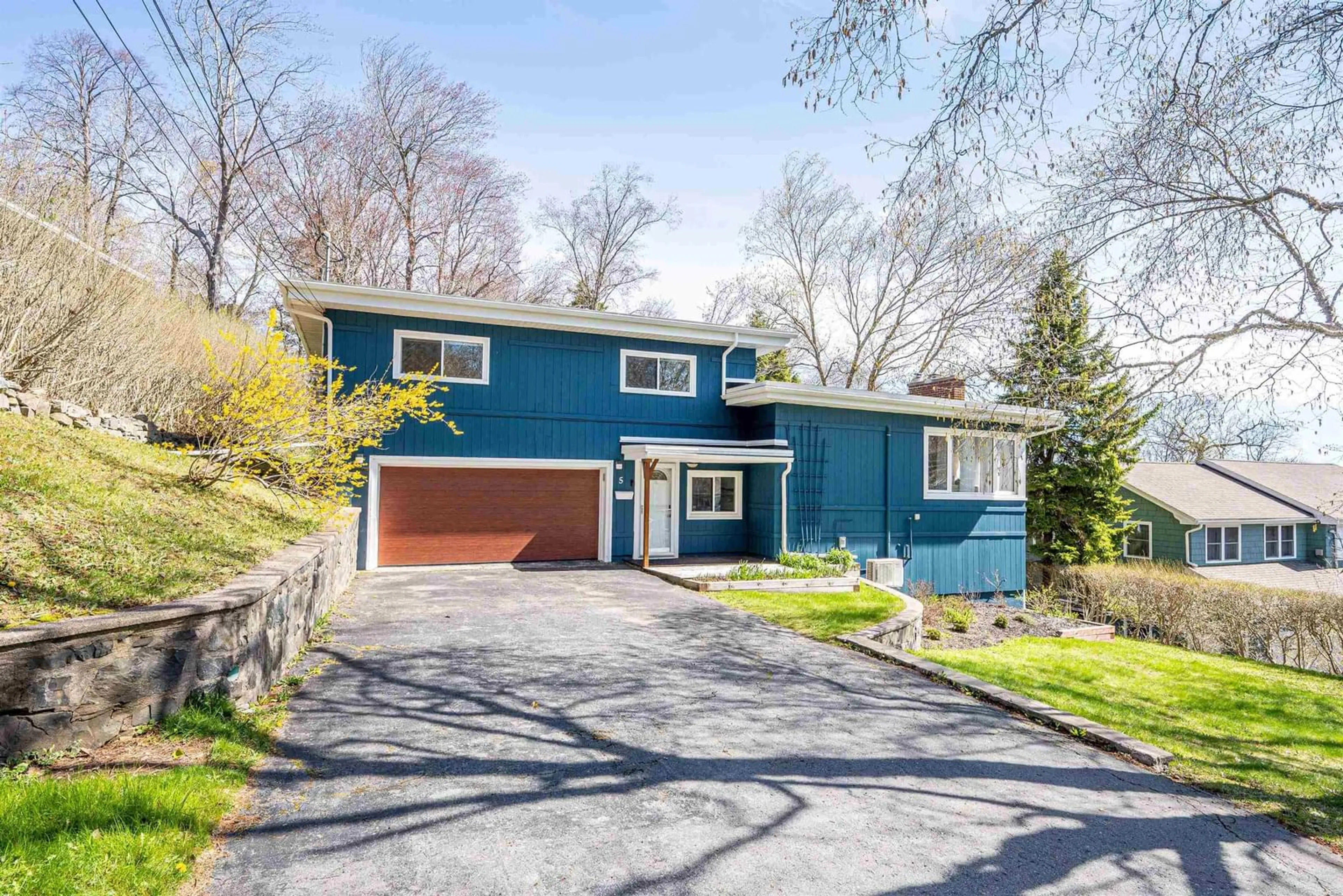 Home with vinyl exterior material, street for 5 Wilson Blvd, Wedgewood Nova Scotia B3M 3E5
