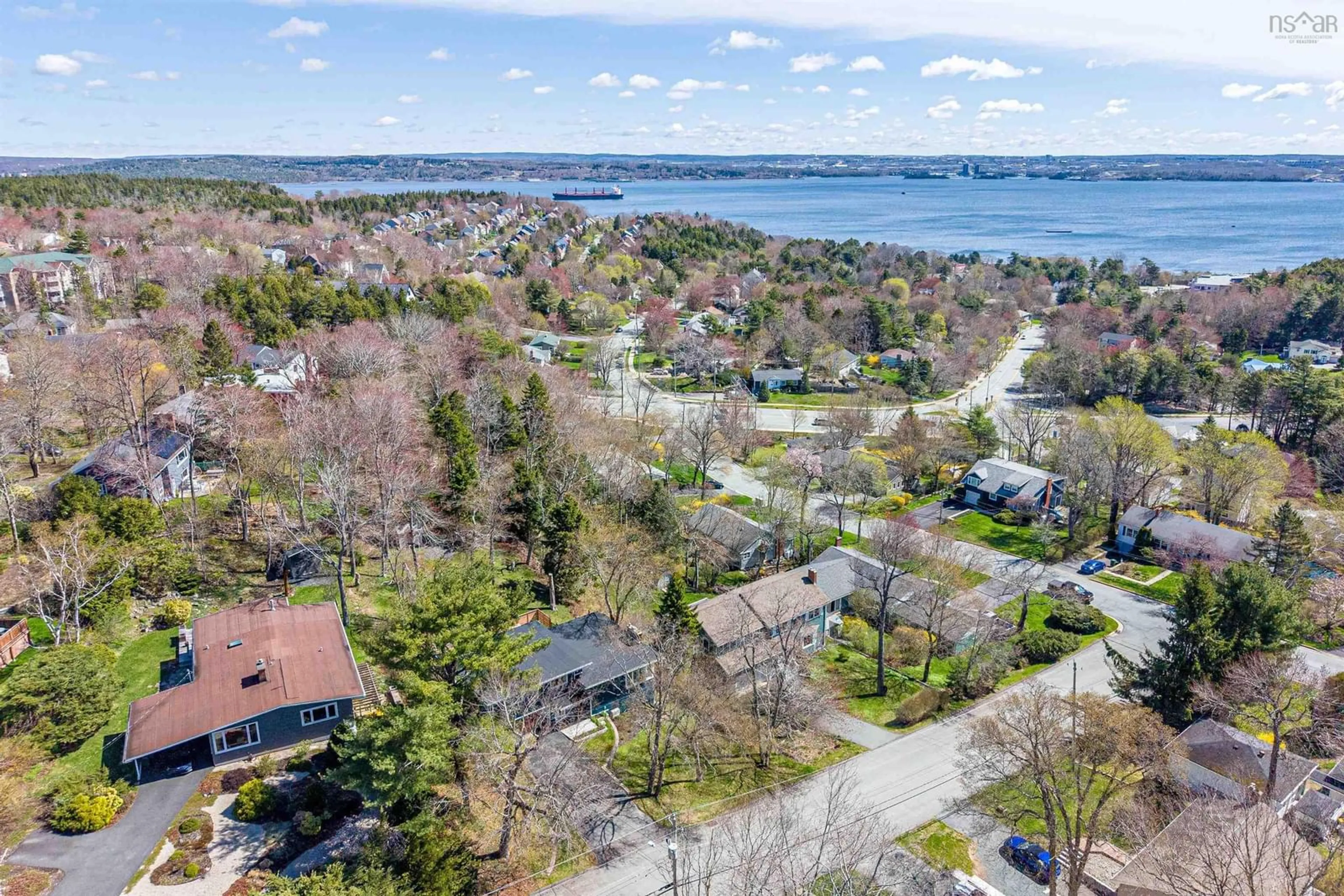 A pic from outside/outdoor area/front of a property/back of a property/a pic from drone, water/lake/river/ocean view for 5 Wilson Blvd, Wedgewood Nova Scotia B3M 3E5