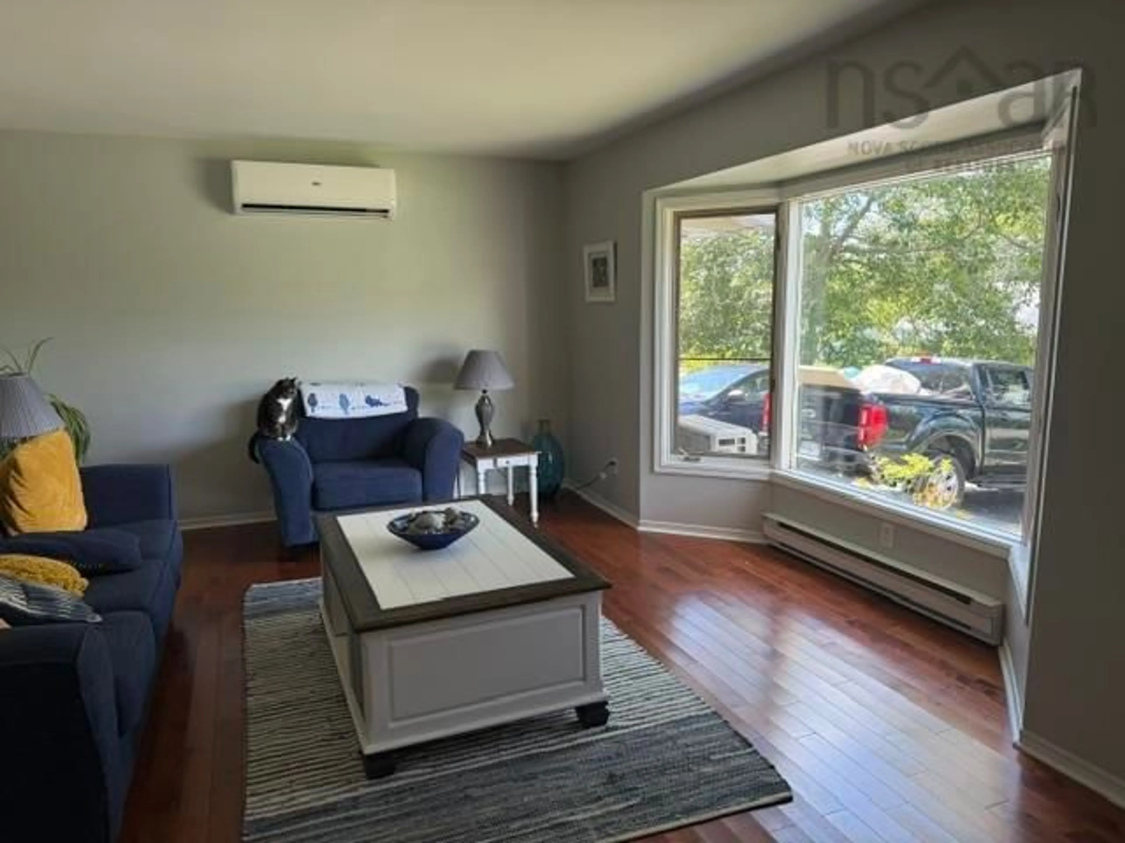 Living room with furniture, wood/laminate floor for 254 Hollingsworth Drives, Bridgewater Nova Scotia B4V 3V2