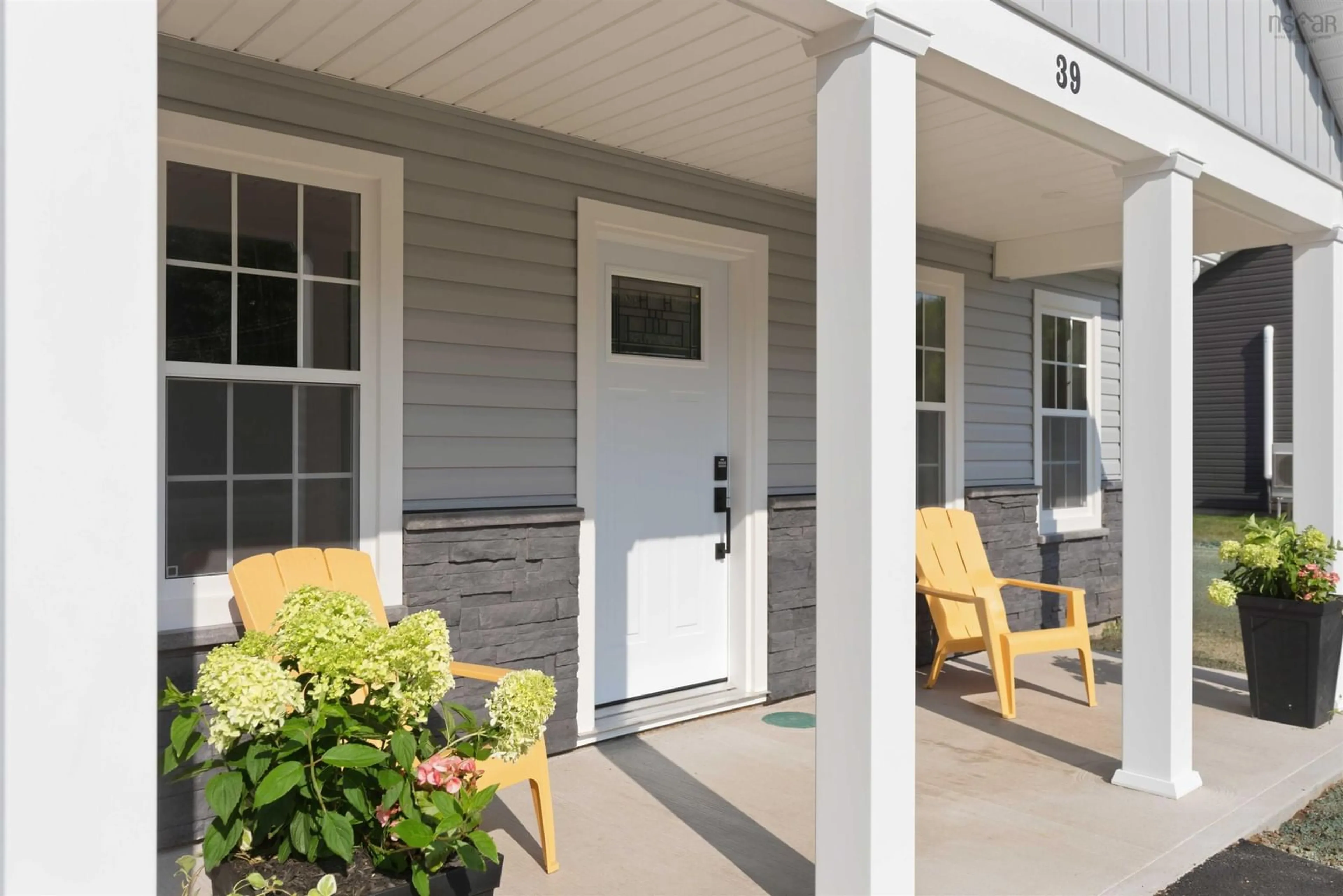 Home with vinyl exterior material, street for 39 Saratoga Dr, Centreville Nova Scotia B0P 1J0