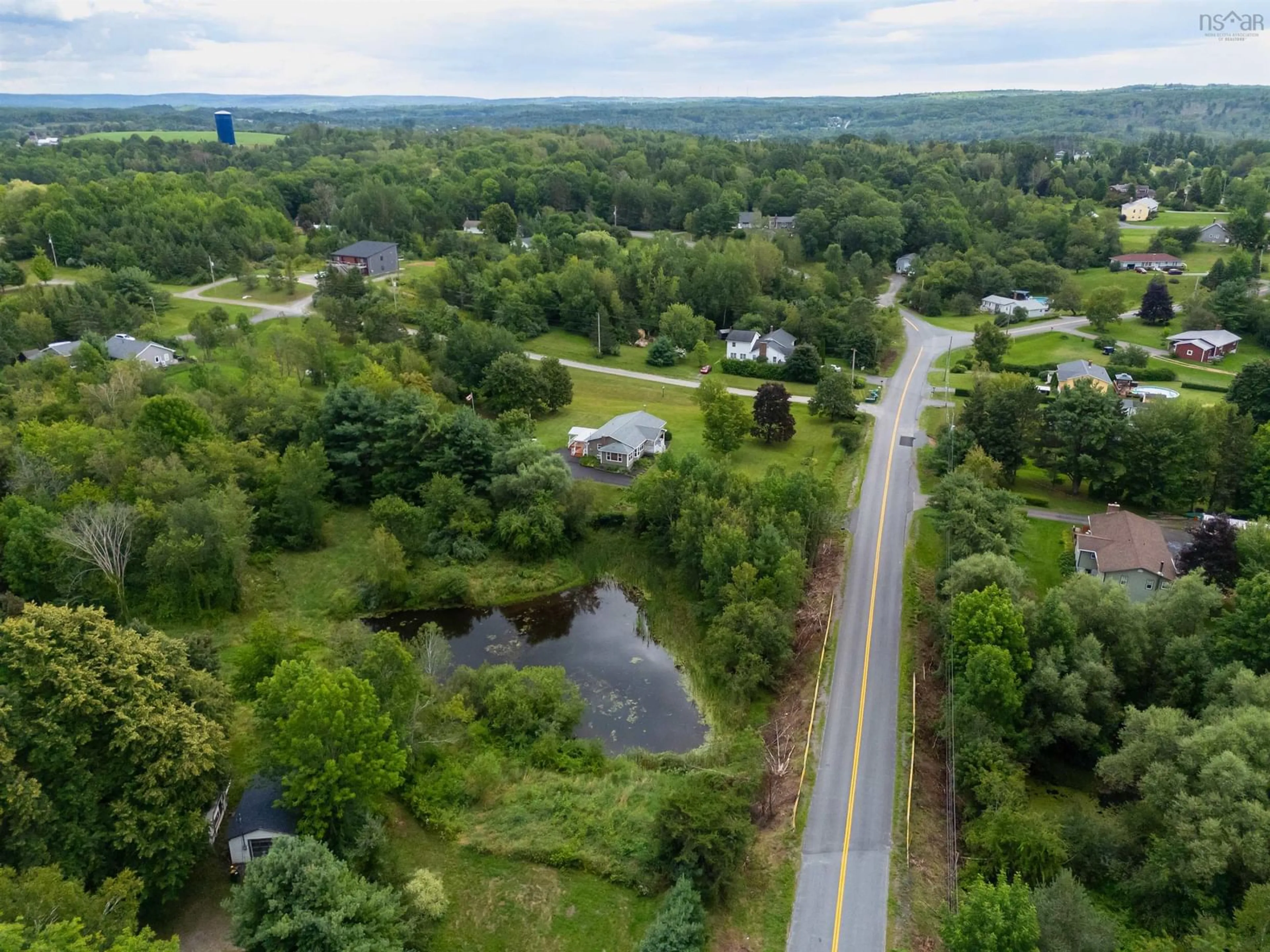 A pic from outside/outdoor area/front of a property/back of a property/a pic from drone, water/lake/river/ocean view for 117 Dill Rd, Currys Corner Nova Scotia B0N 2T0