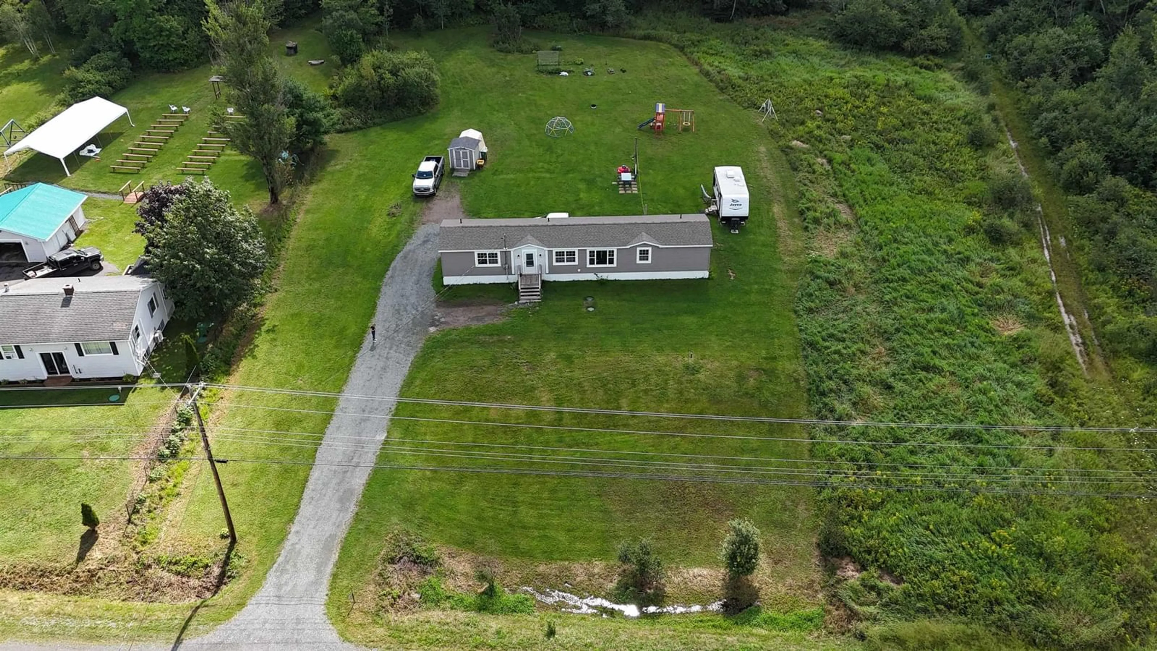 A pic from outside/outdoor area/front of a property/back of a property/a pic from drone, unknown for 20533 Highway 2, Shubenacadie East Nova Scotia B0N 2H0