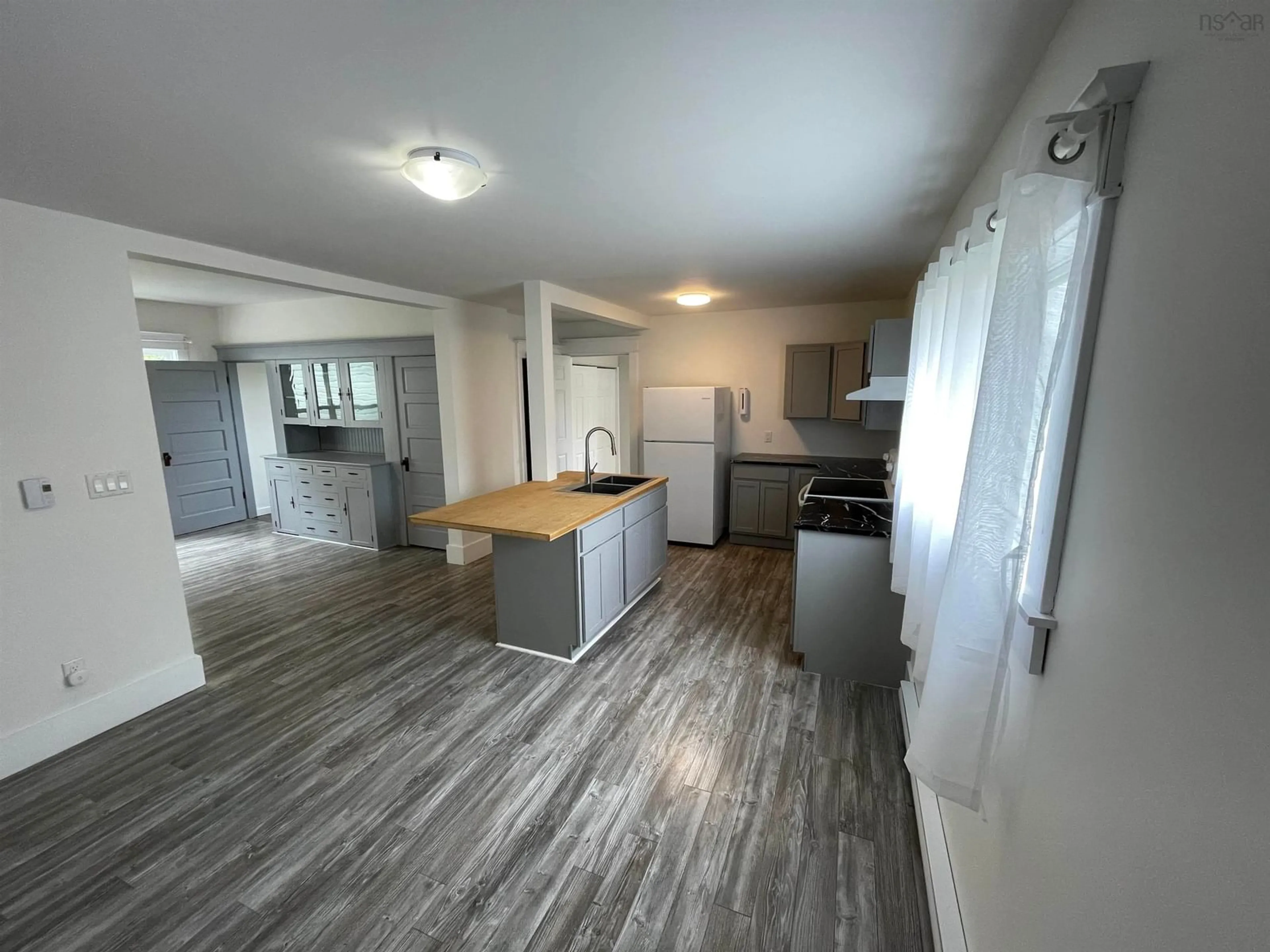 Open concept kitchen, wood/laminate floor for 165 Ryland Ave, Bible Hill Nova Scotia B2N 2V5