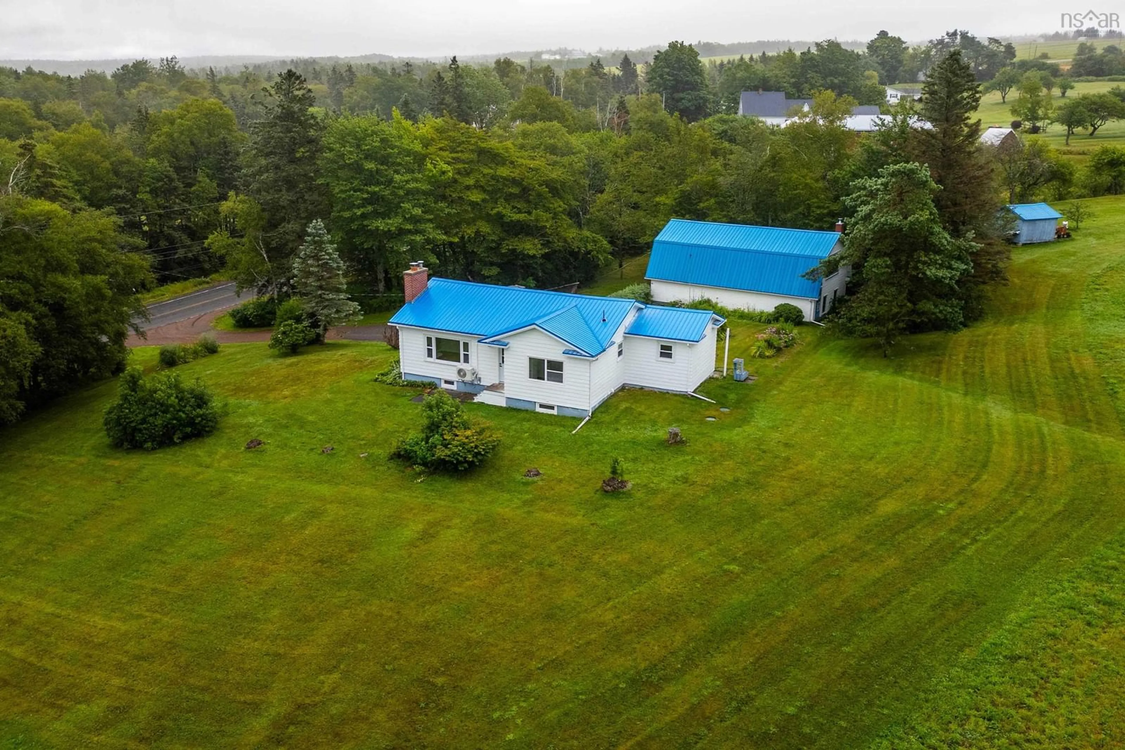 A pic from outside/outdoor area/front of a property/back of a property/a pic from drone, water/lake/river/ocean view for 18785 Highway 2, Fenwick Nova Scotia B0L 1C0