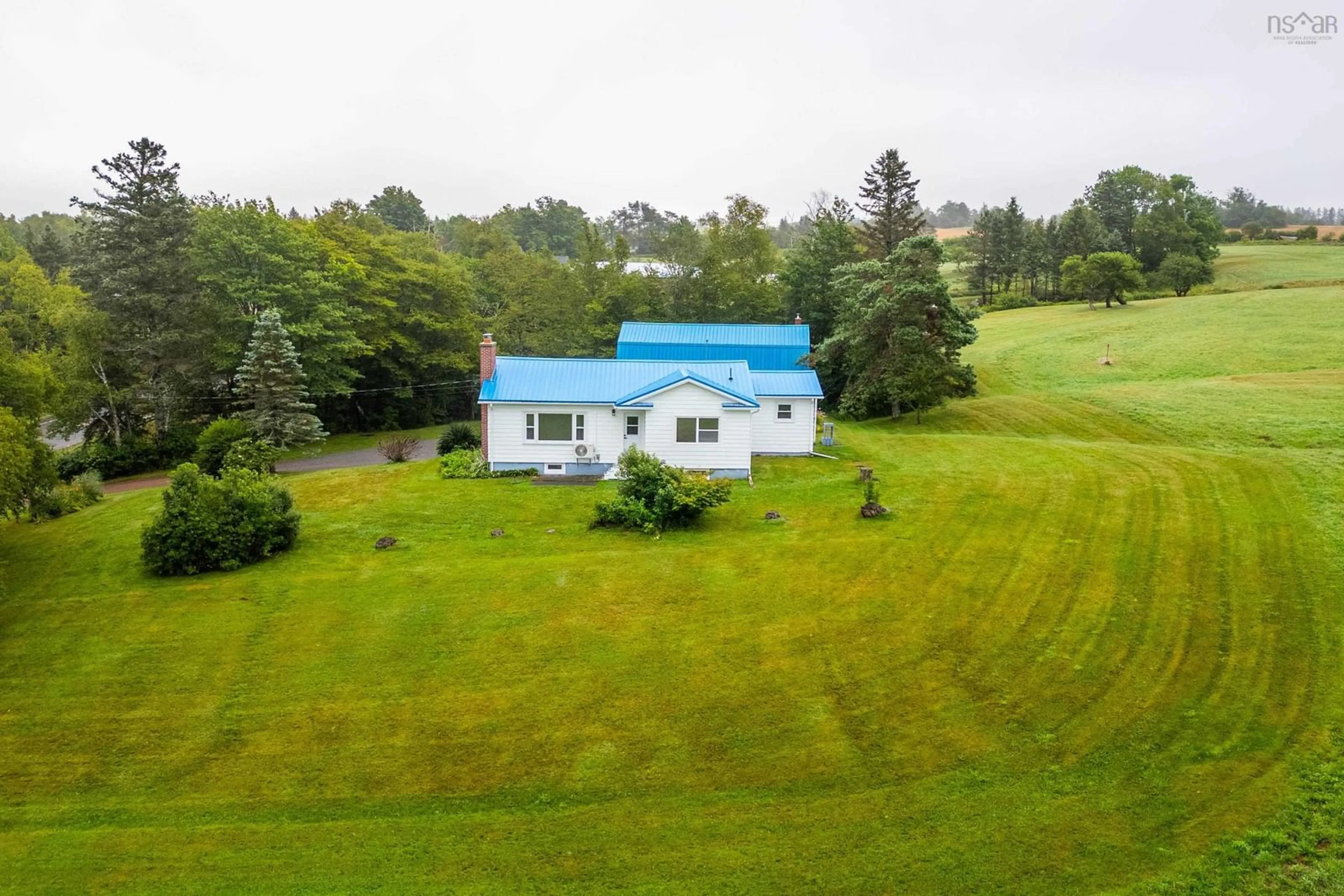 A pic from outside/outdoor area/front of a property/back of a property/a pic from drone, unknown for 18785 Highway 2, Fenwick Nova Scotia B0L 1C0