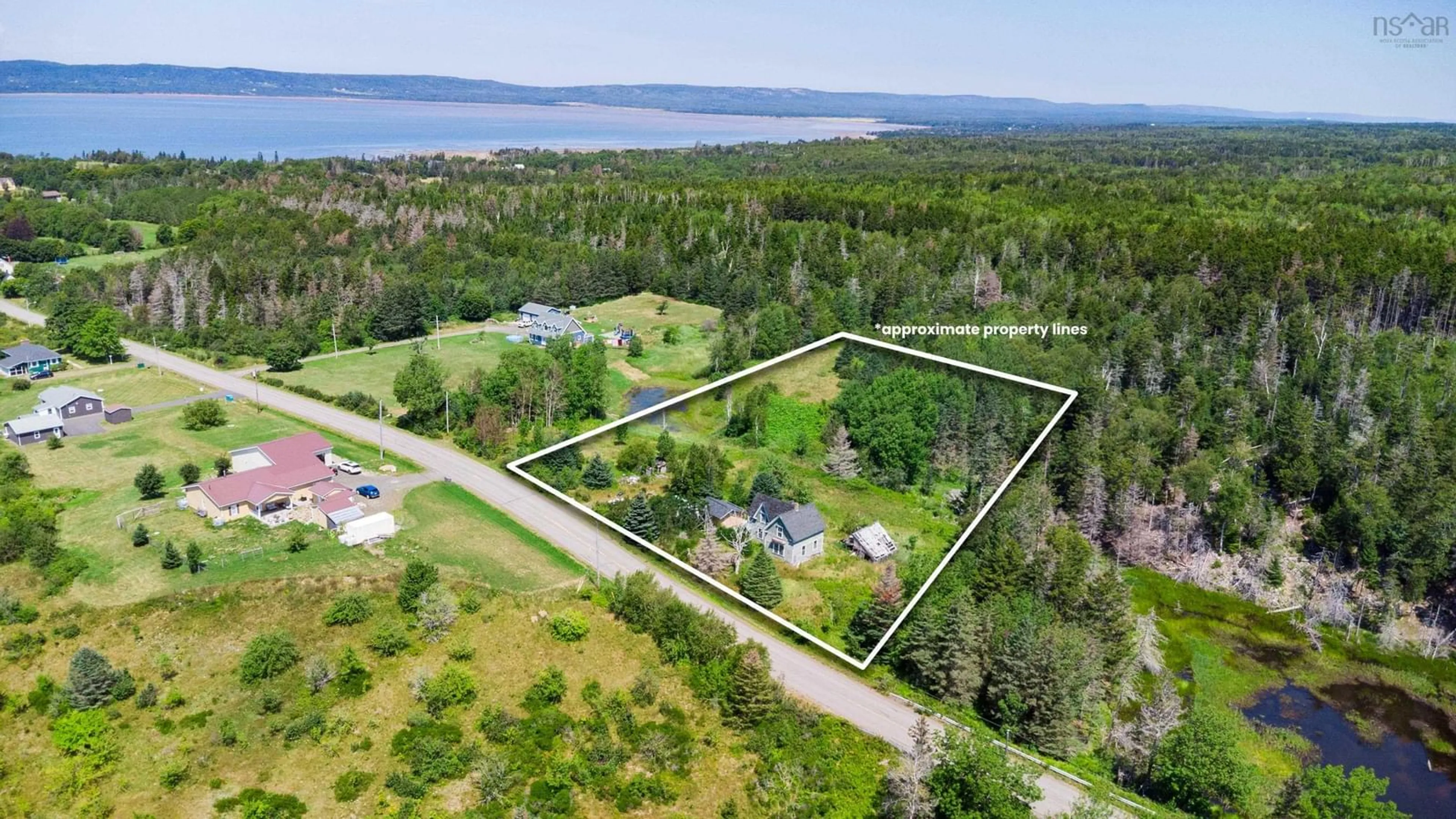 A pic from outside/outdoor area/front of a property/back of a property/a pic from drone, water/lake/river/ocean view for 145 North Range Cross Road, Barton Nova Scotia B0W 1H0