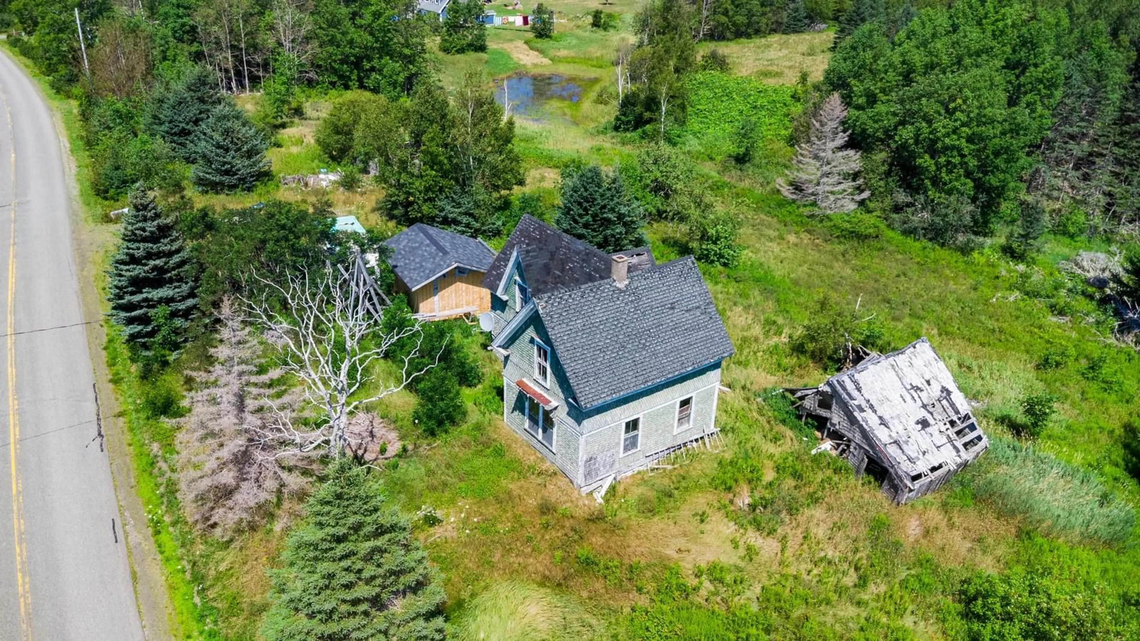 A pic from outside/outdoor area/front of a property/back of a property/a pic from drone, unknown for 145 North Range Cross Road, Barton Nova Scotia B0W 1H0