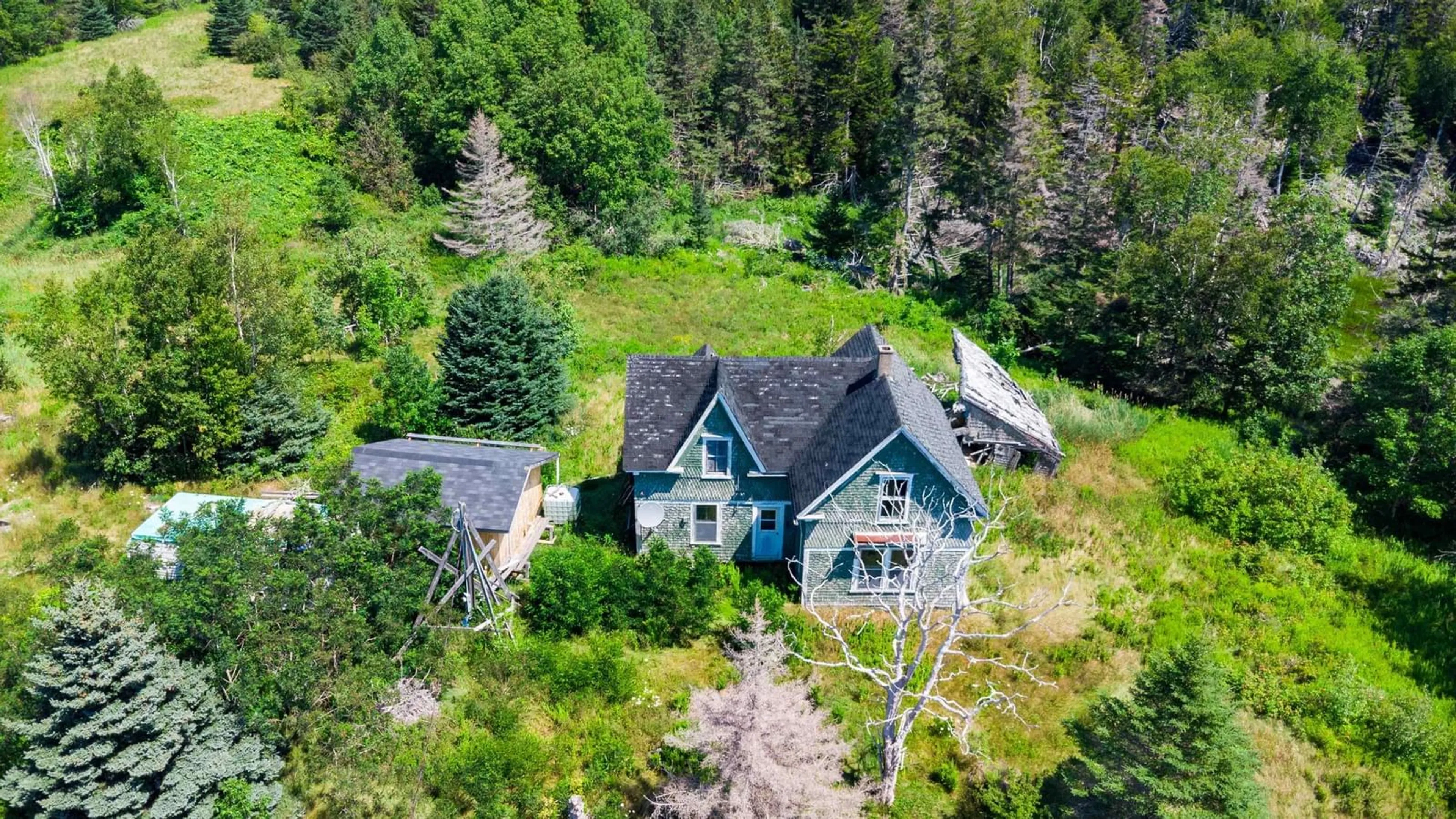 A pic from outside/outdoor area/front of a property/back of a property/a pic from drone, unknown for 145 North Range Cross Road, Barton Nova Scotia B0W 1H0