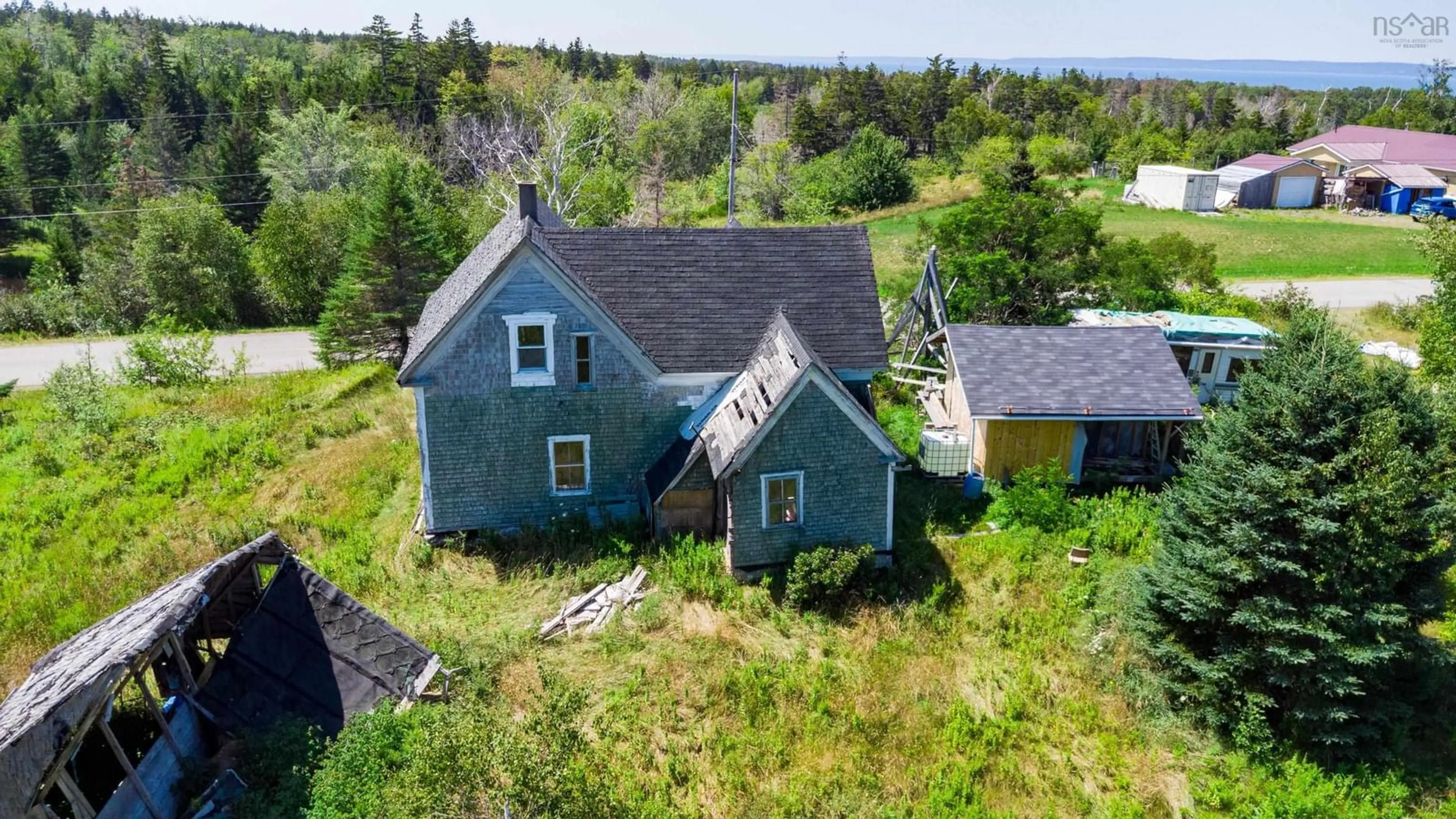 A pic from outside/outdoor area/front of a property/back of a property/a pic from drone, unknown for 145 North Range Cross Road, Barton Nova Scotia B0W 1H0