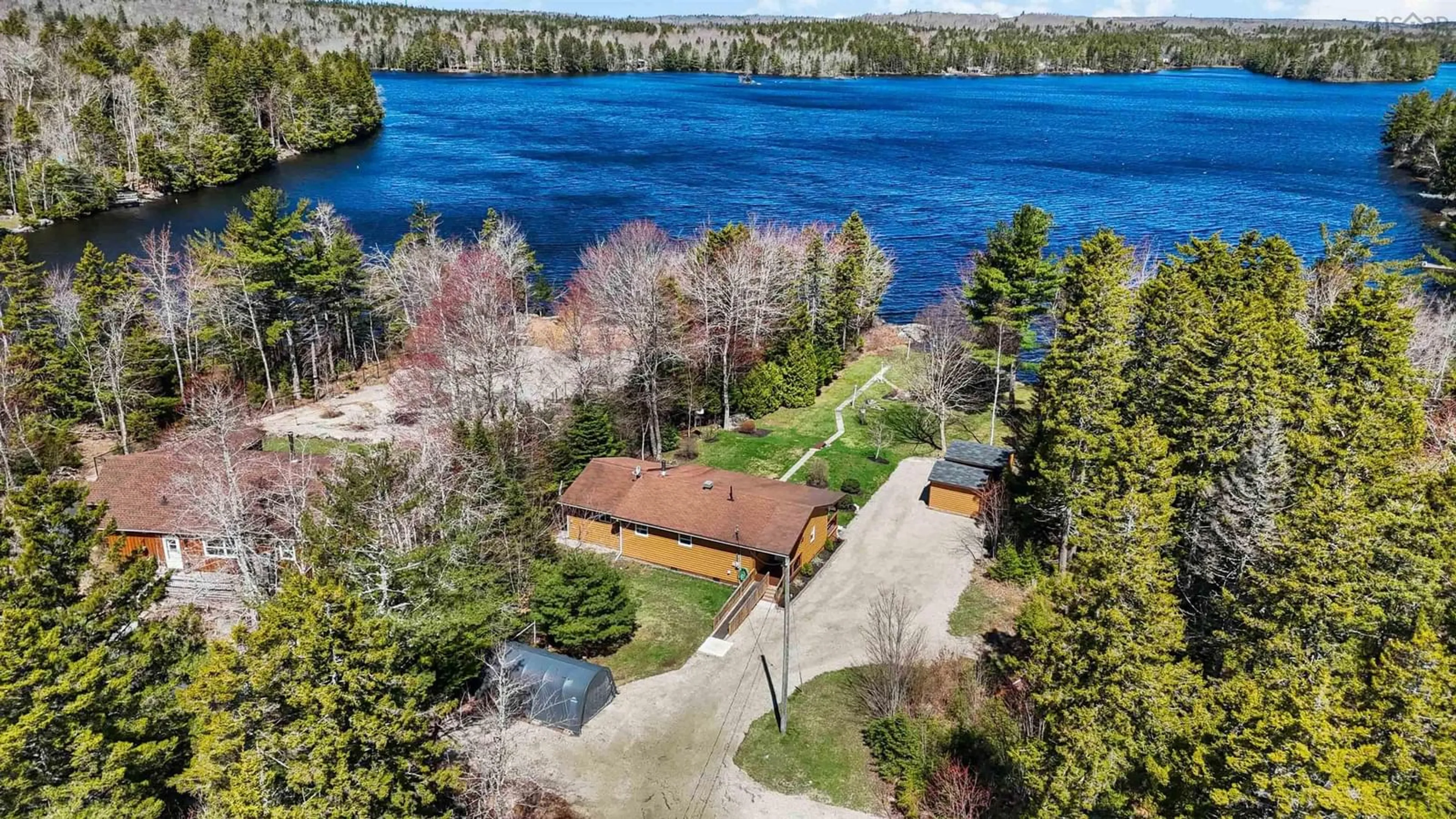A pic from outside/outdoor area/front of a property/back of a property/a pic from drone, water/lake/river/ocean view for 198 Spruce Dr, Barss Corner Nova Scotia B0R 1E0