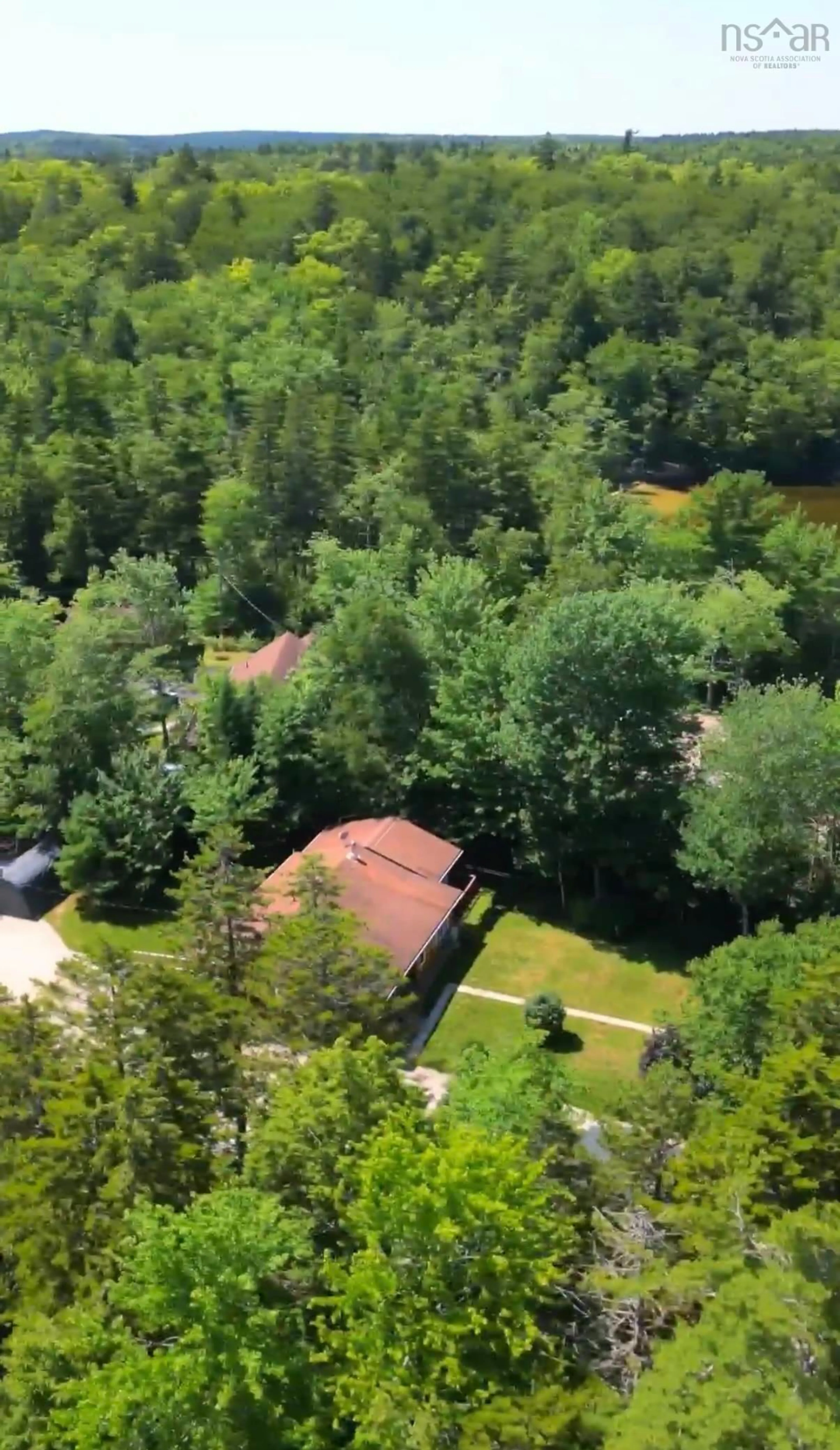 A pic from outside/outdoor area/front of a property/back of a property/a pic from drone, forest/trees view for 198 Spruce Dr, Barss Corner Nova Scotia B0R 1E0